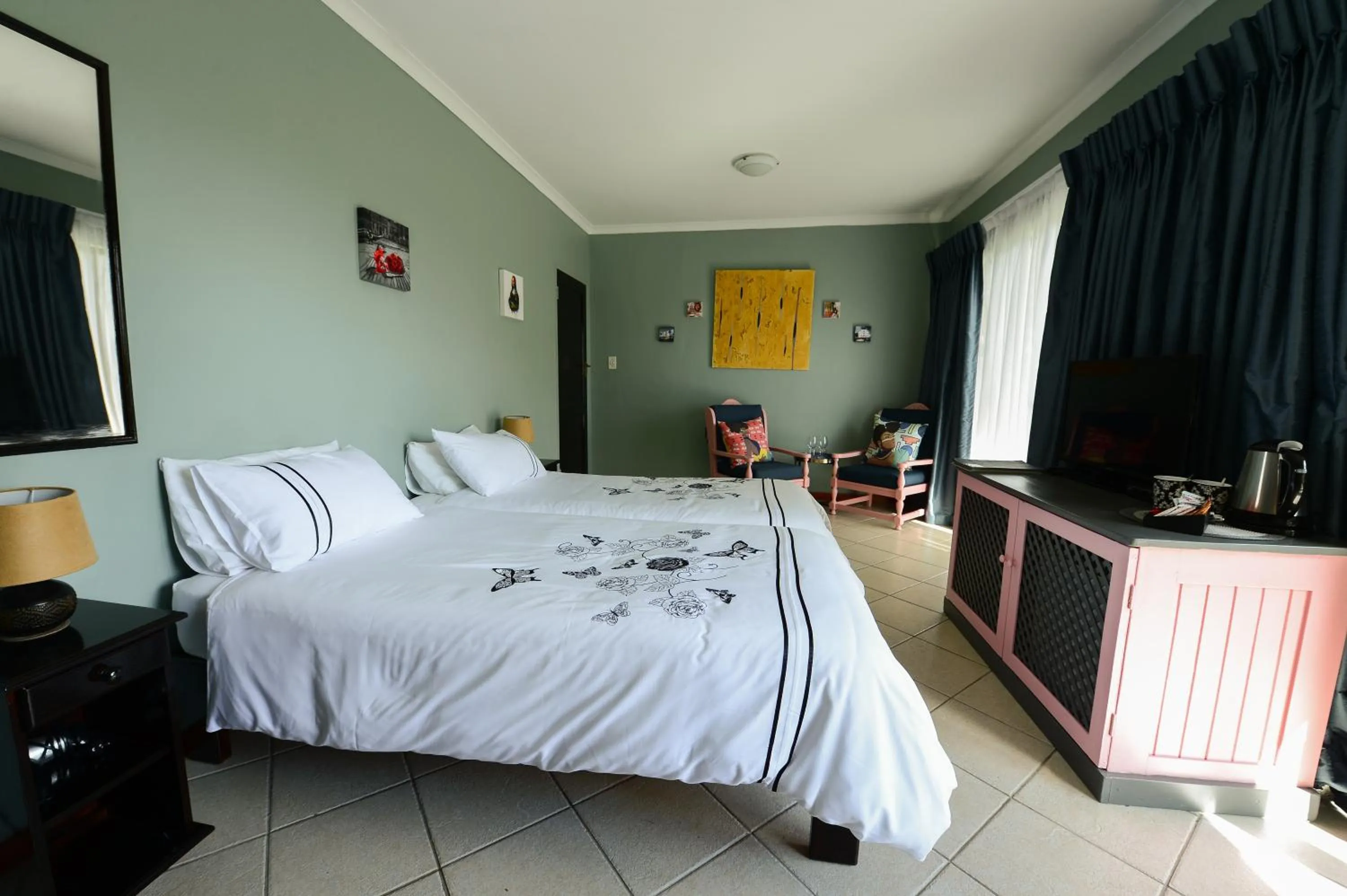 Bed in De Wingerd Wijnland Lodge