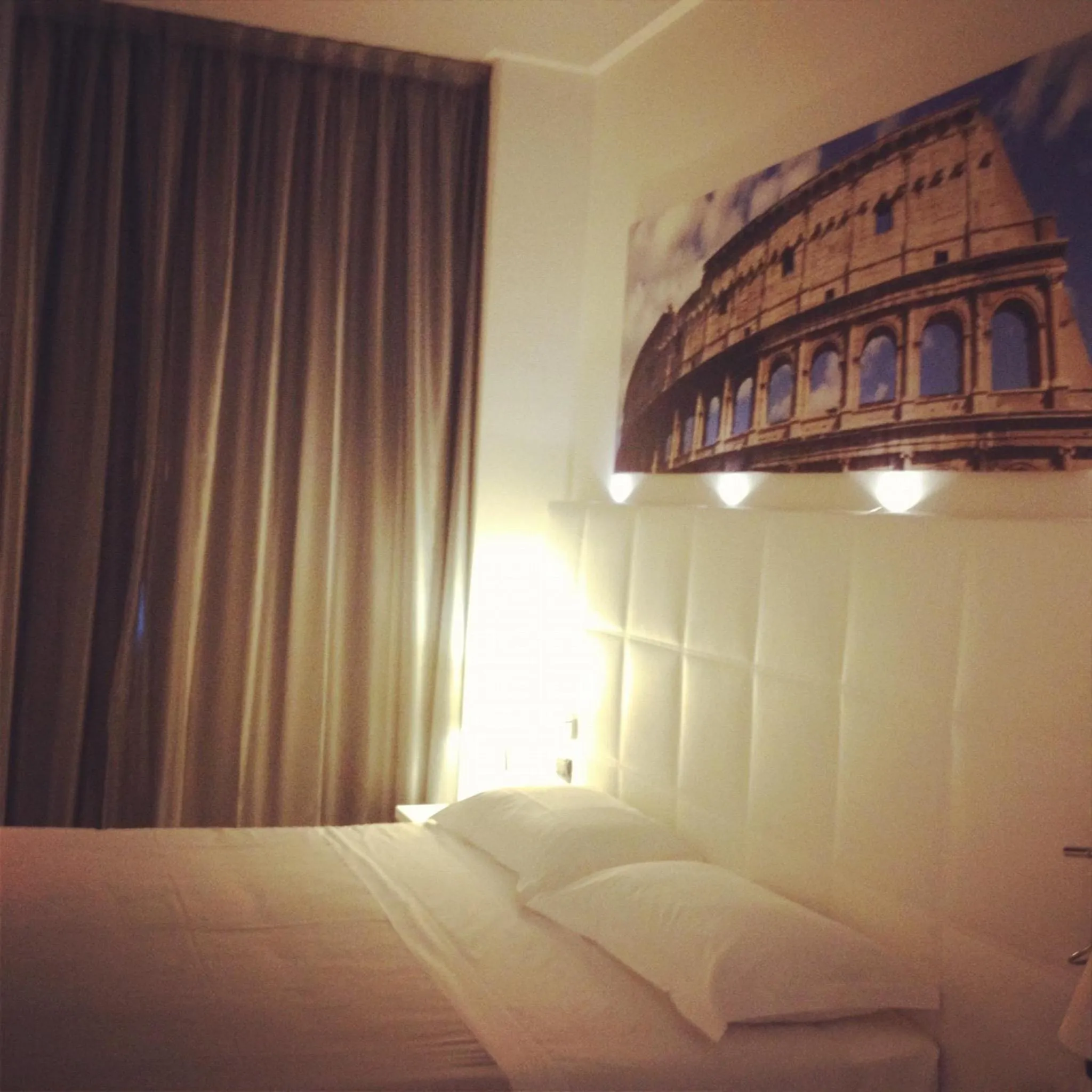 Bed in Amatì Design Green Hotel