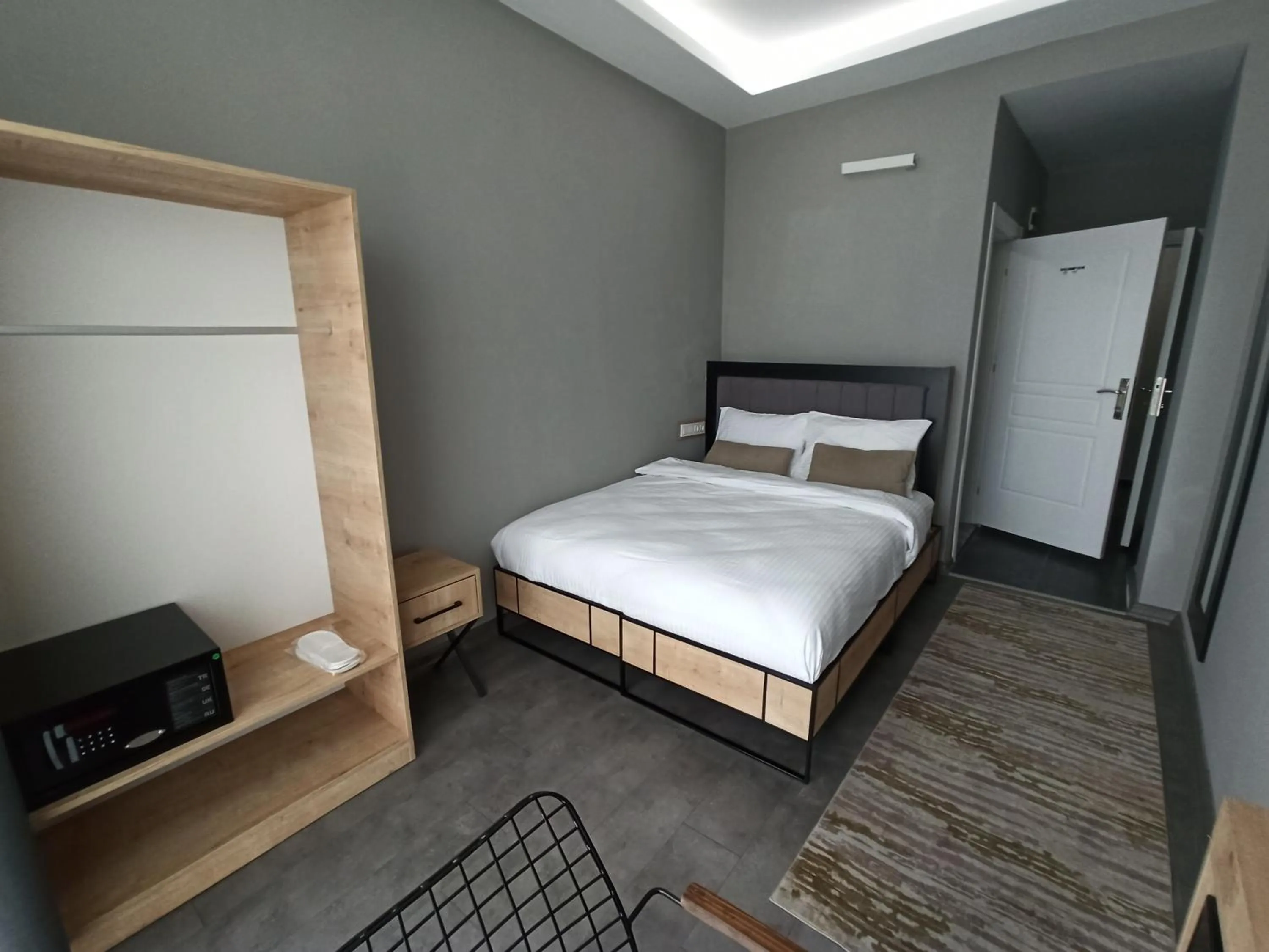 Bed in Skylon Airport Hotel