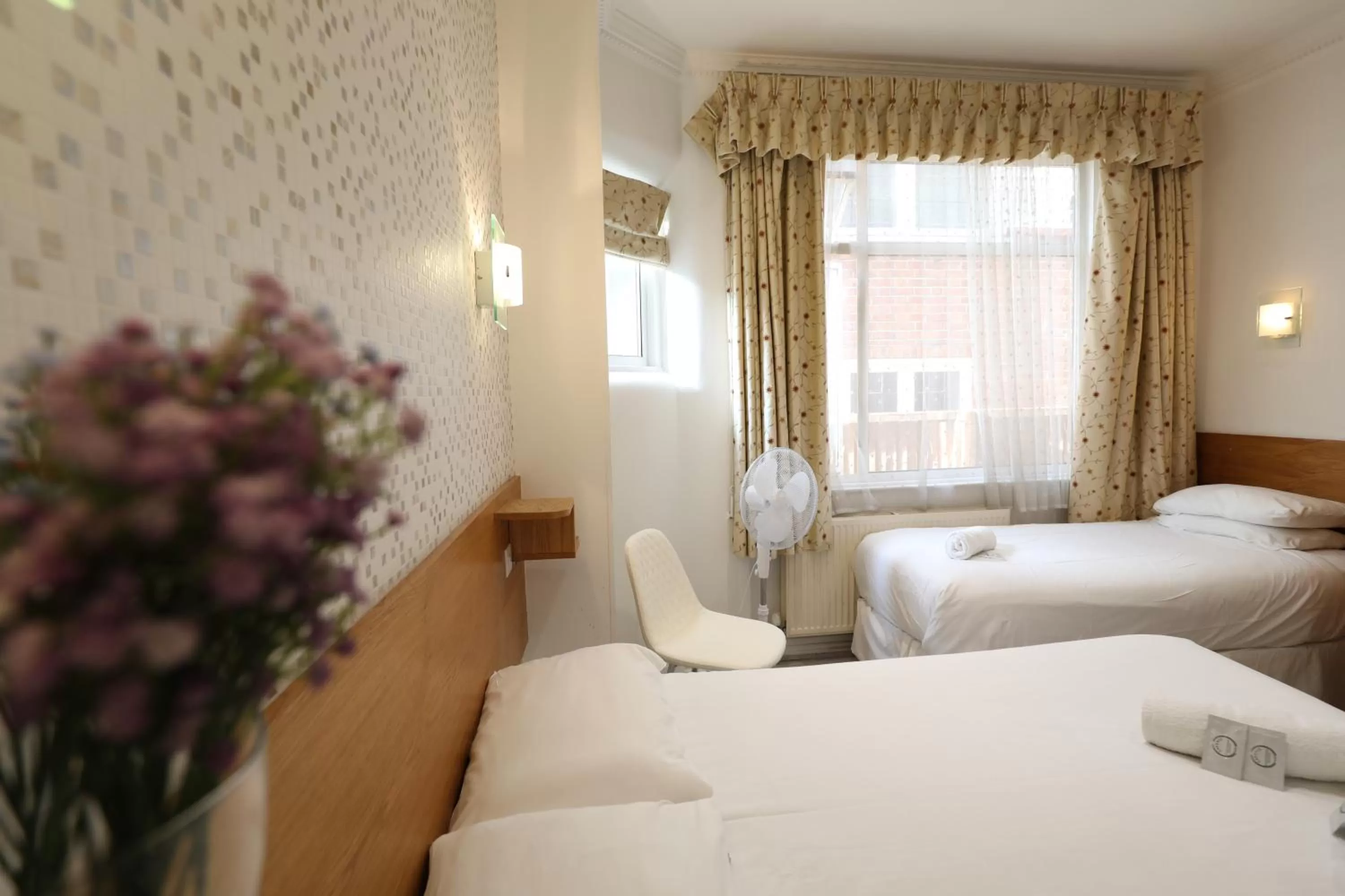 Bed in Anchor Guest House