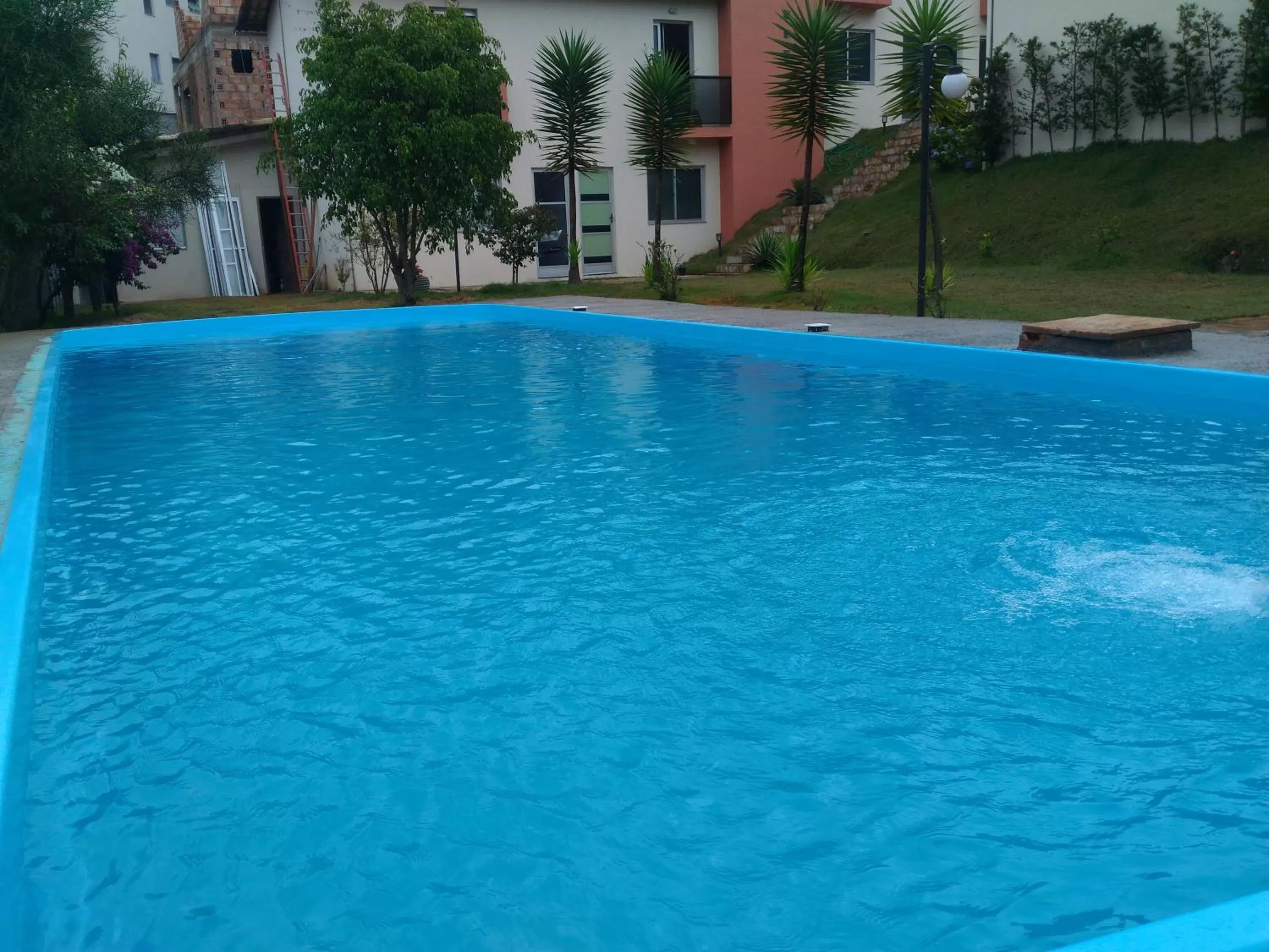 Swimming pool in Pousada Vila Real Flats