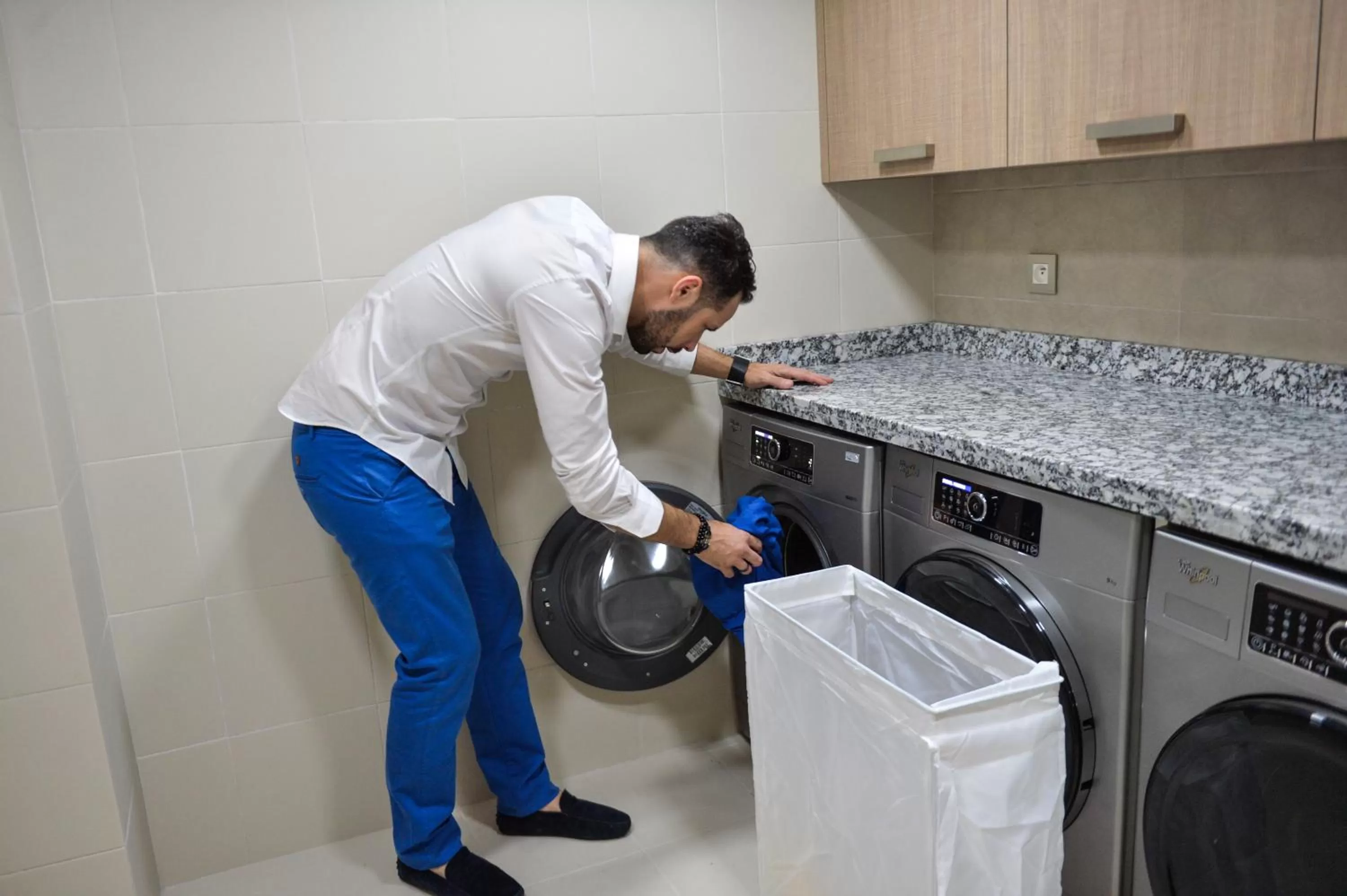 washing machine in Le 22 Appart'Hotel