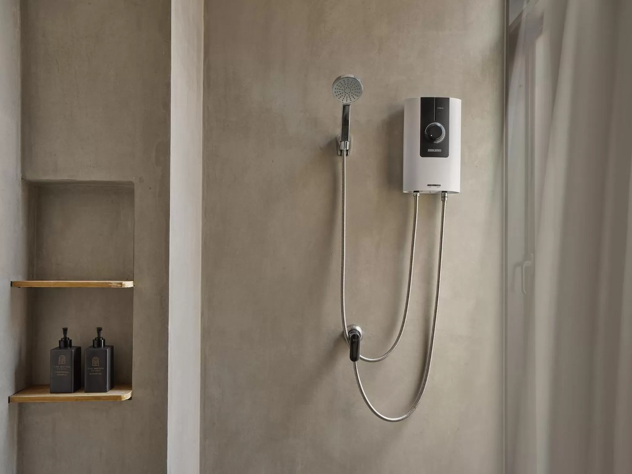 Bathroom in The Motifs Eco Hotel - SHA Extra Plus