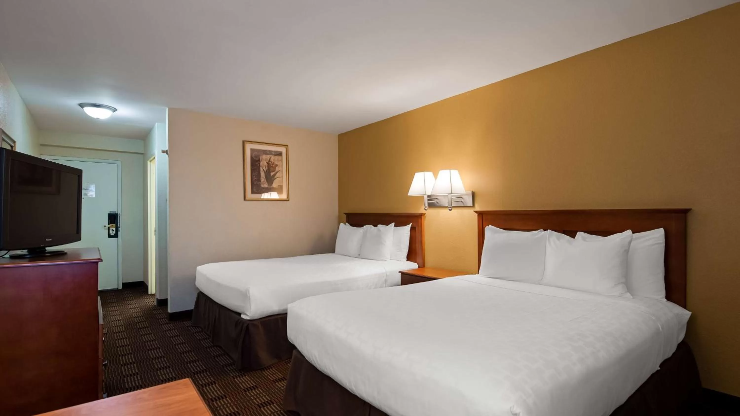Queen Room with Two Queen Beds with Roll in Shower in SureStay Hotel by Best Western East Brunswick