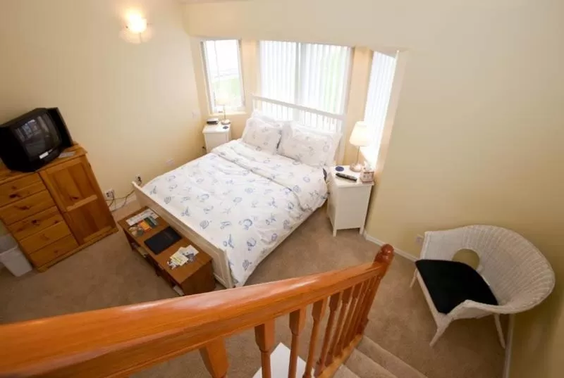 Bed in Driftwood Inn