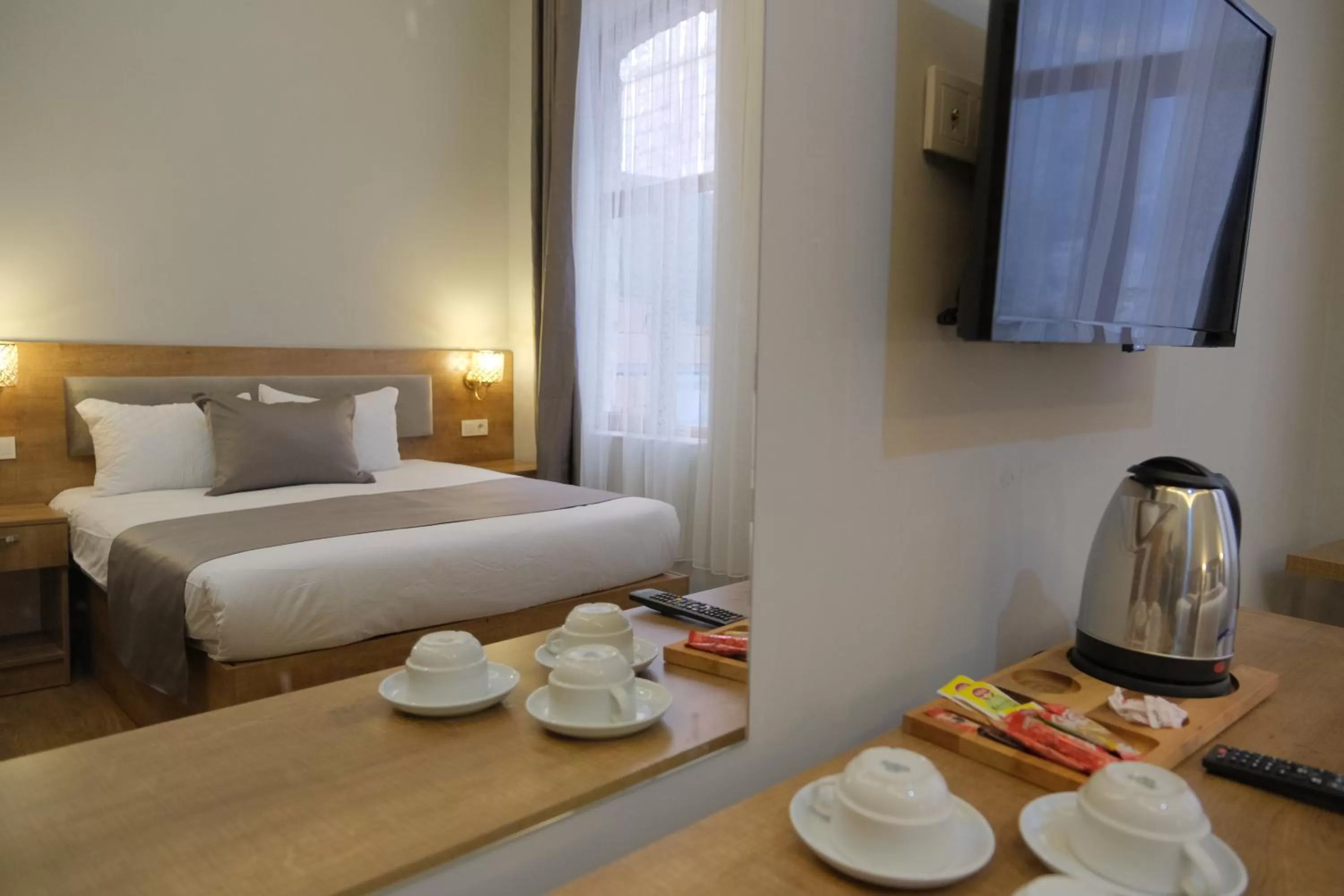 TV and multimedia, Bed in Adamantides Hotel