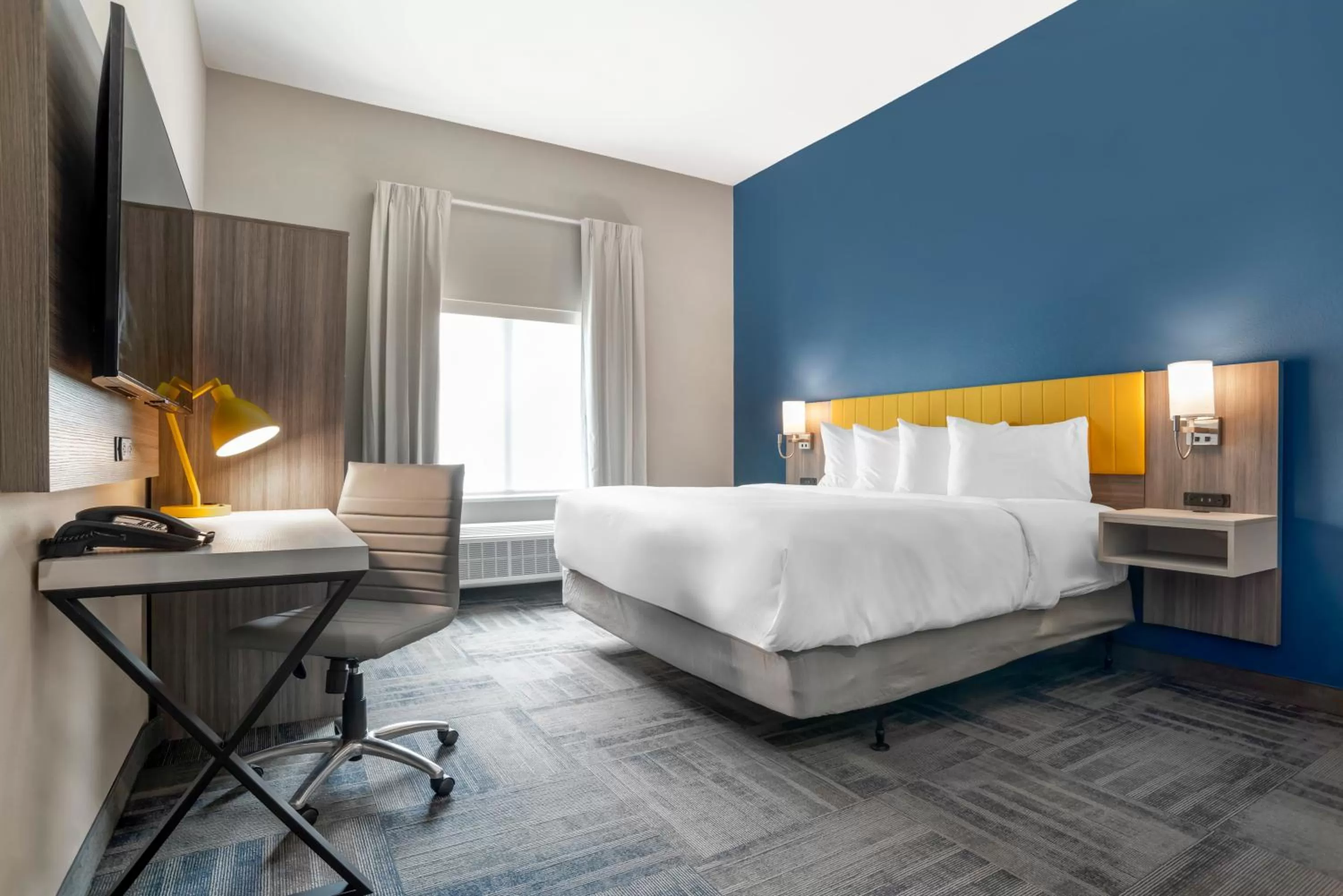 Bed in Comfort Inn & Suites Destin near Henderson Beach