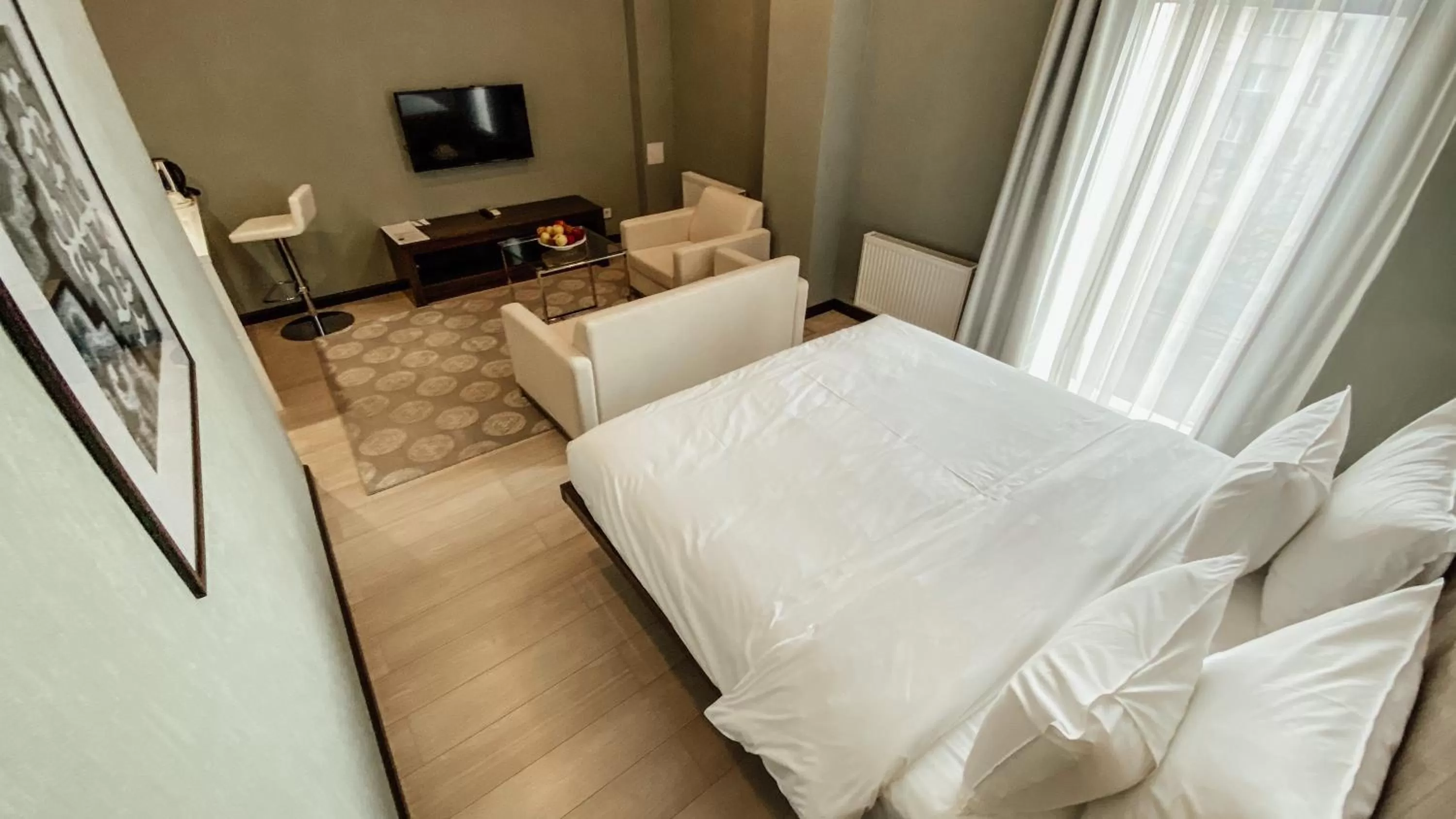 Photo of the whole room, Bed in Resident City Hotel