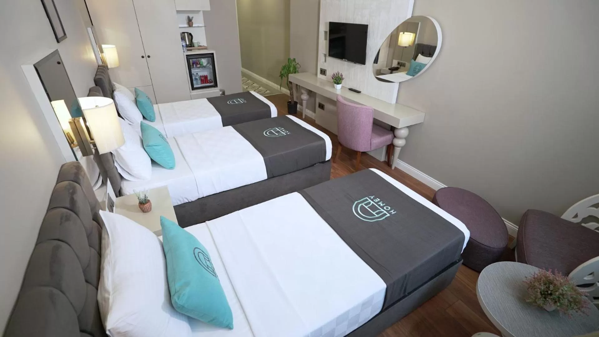 Bed in Homey AirPort Hotel