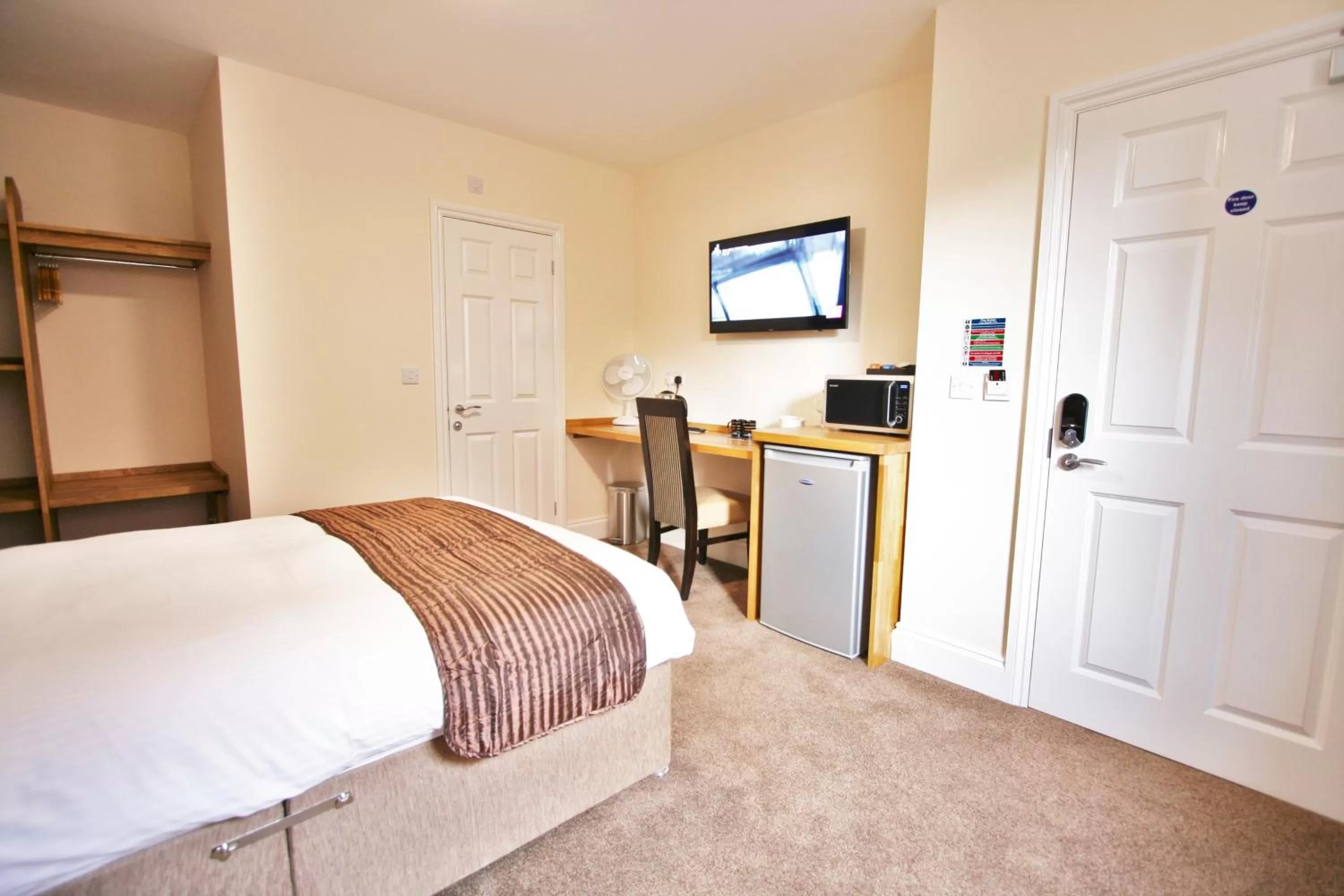 Bed in New County Hotel & Serviced Apartments by RoomsBooked