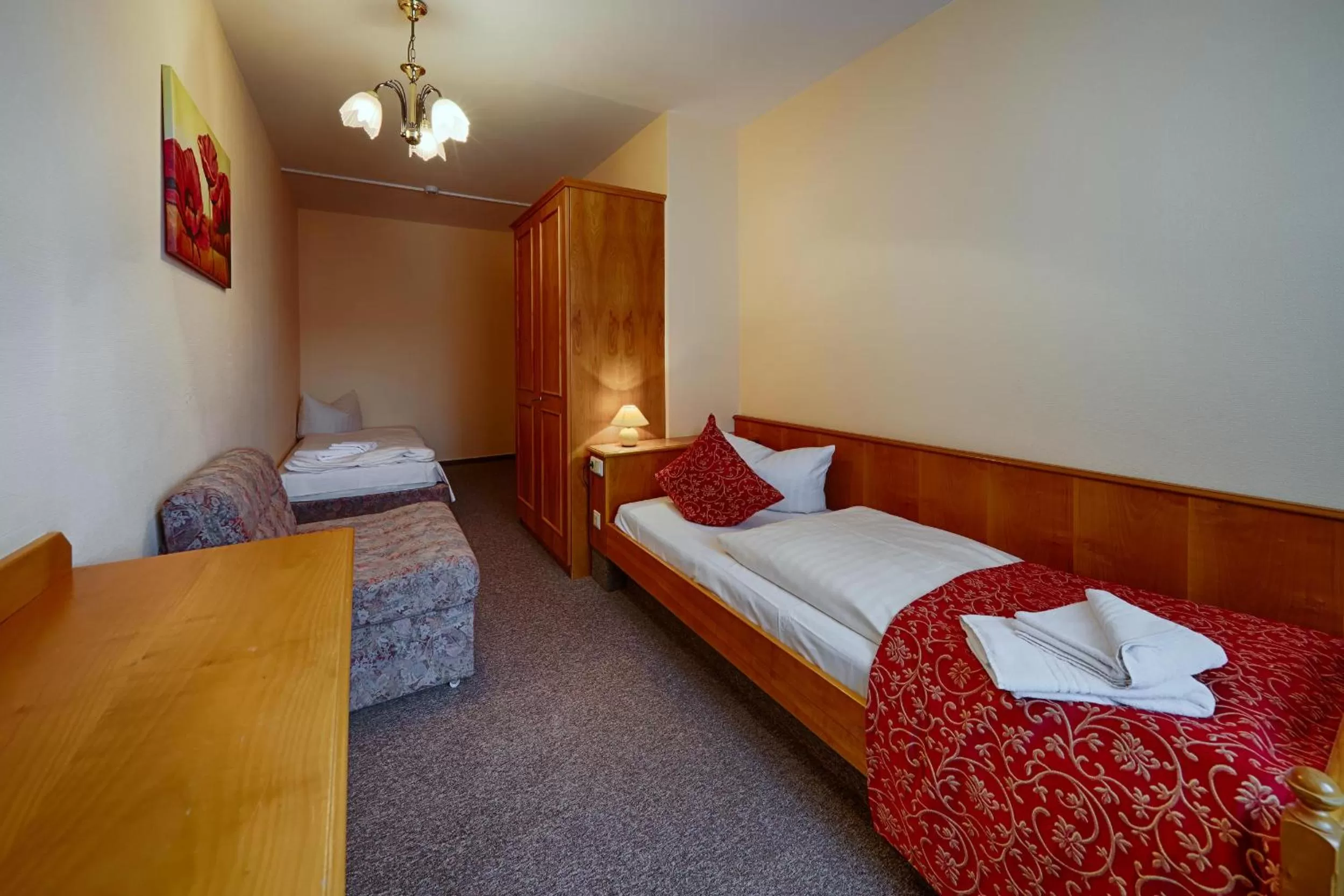 Photo of the whole room, Bed in Hotel Auerhahn