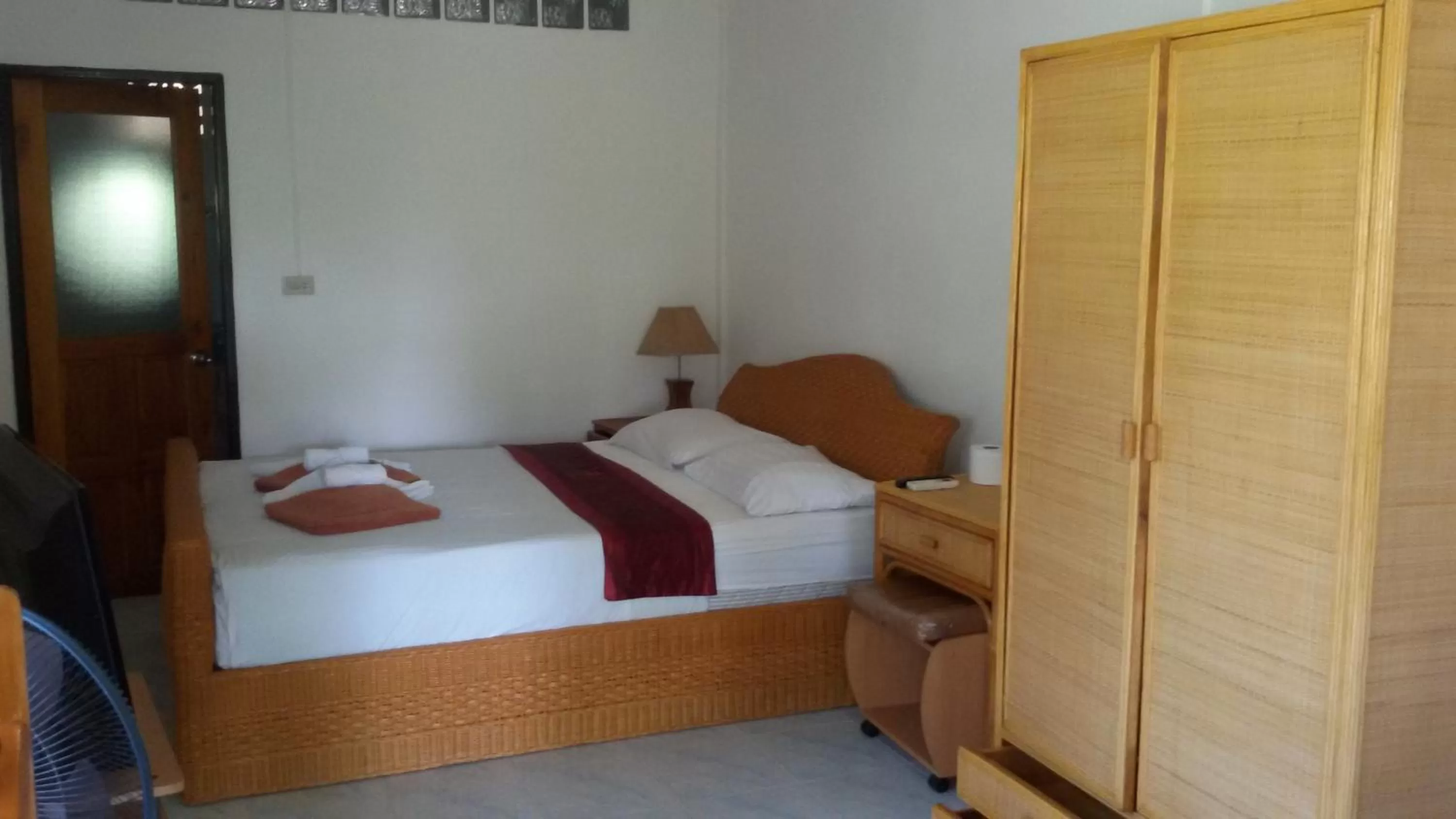 Bed in Jungle Village Bungalow