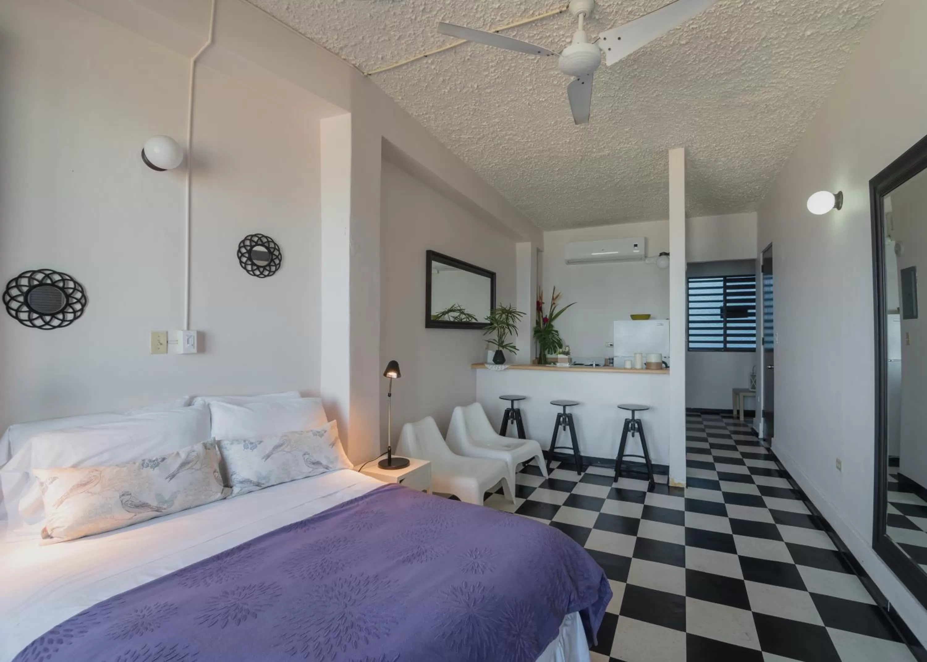 Photo of the whole room, Bed in La Capitana Old San Juan Building