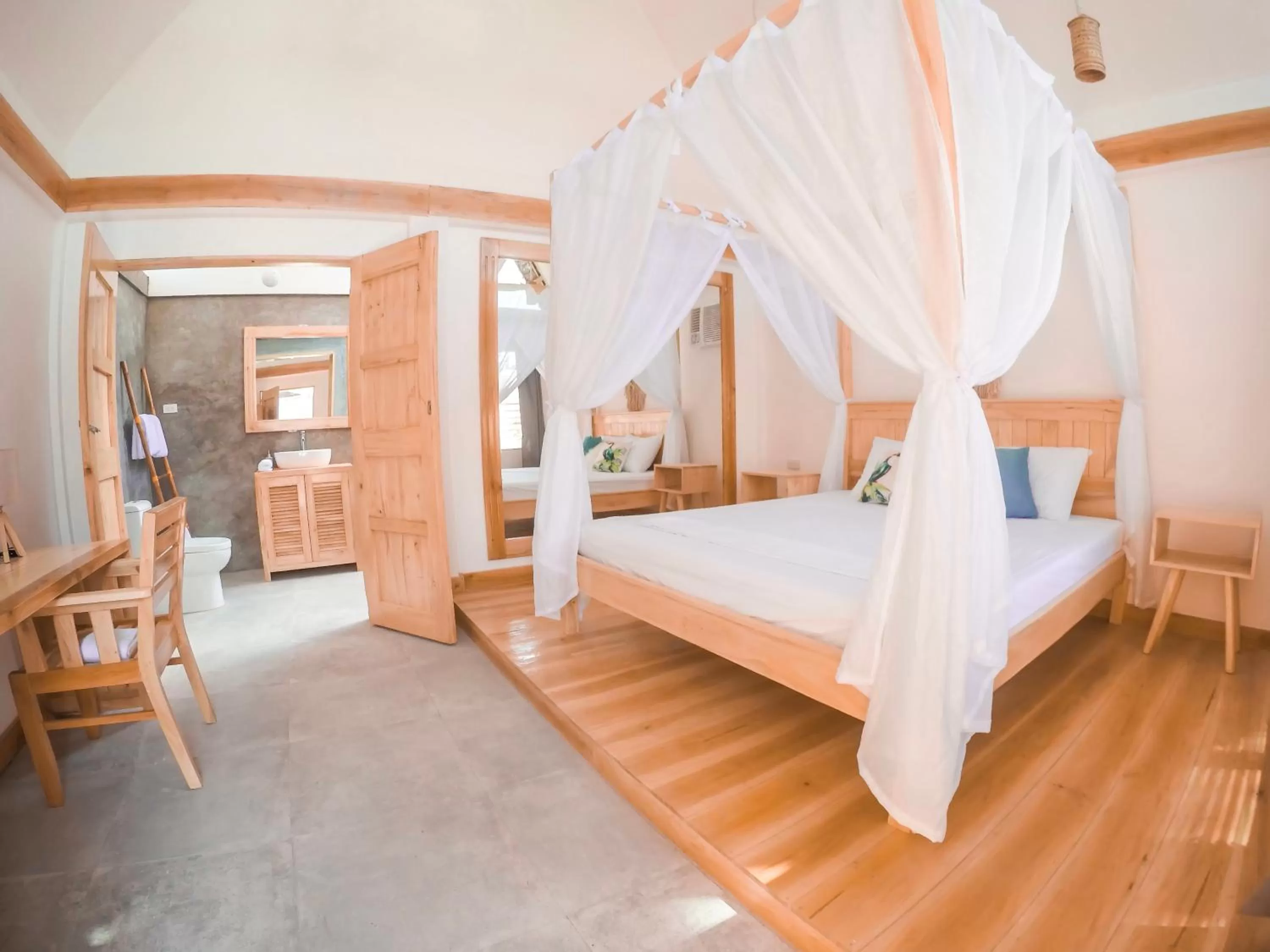 Bed in Bermuda Triangle Bungalows