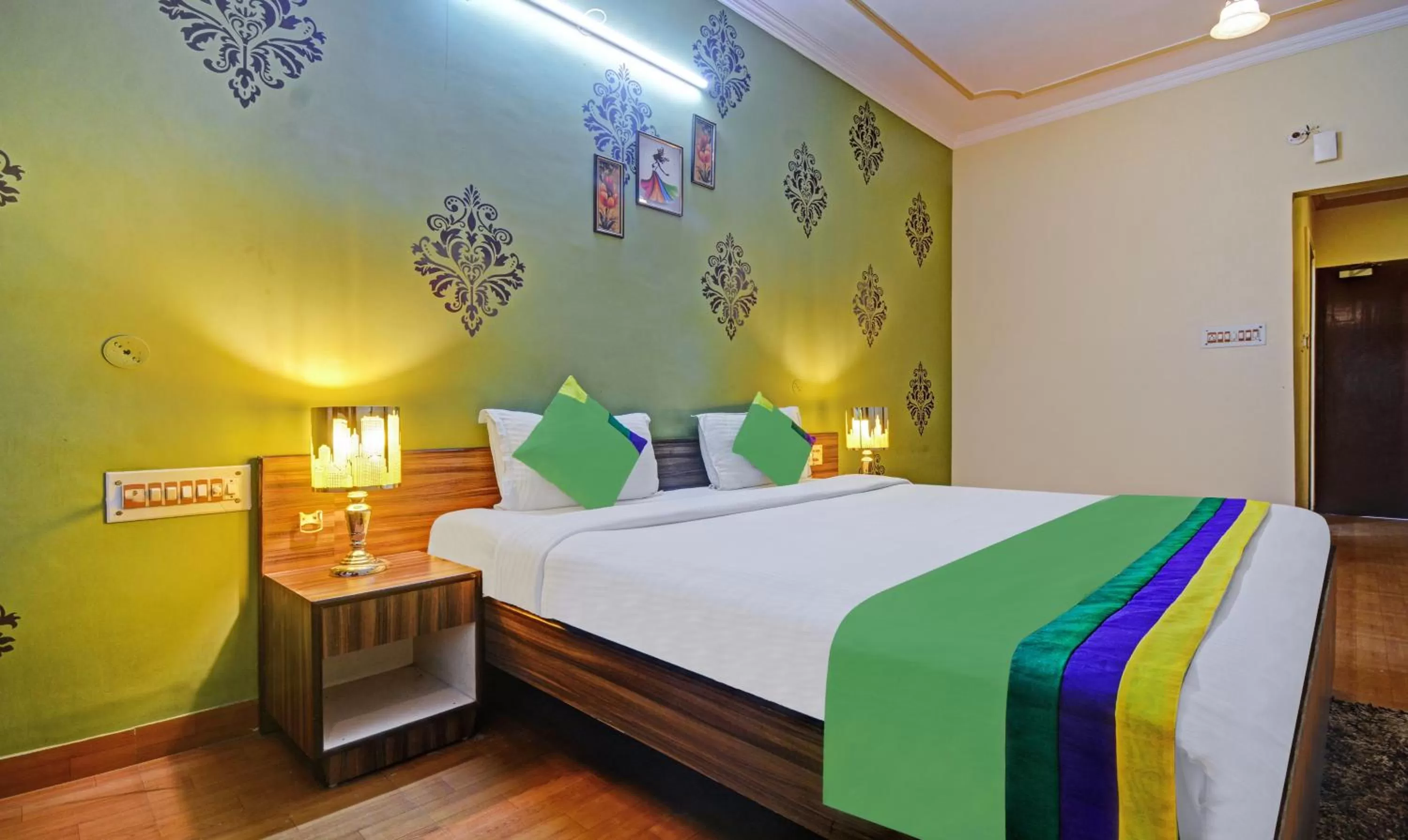 Bedroom, Bed in Treebo New Rockwell Vivek Vihar