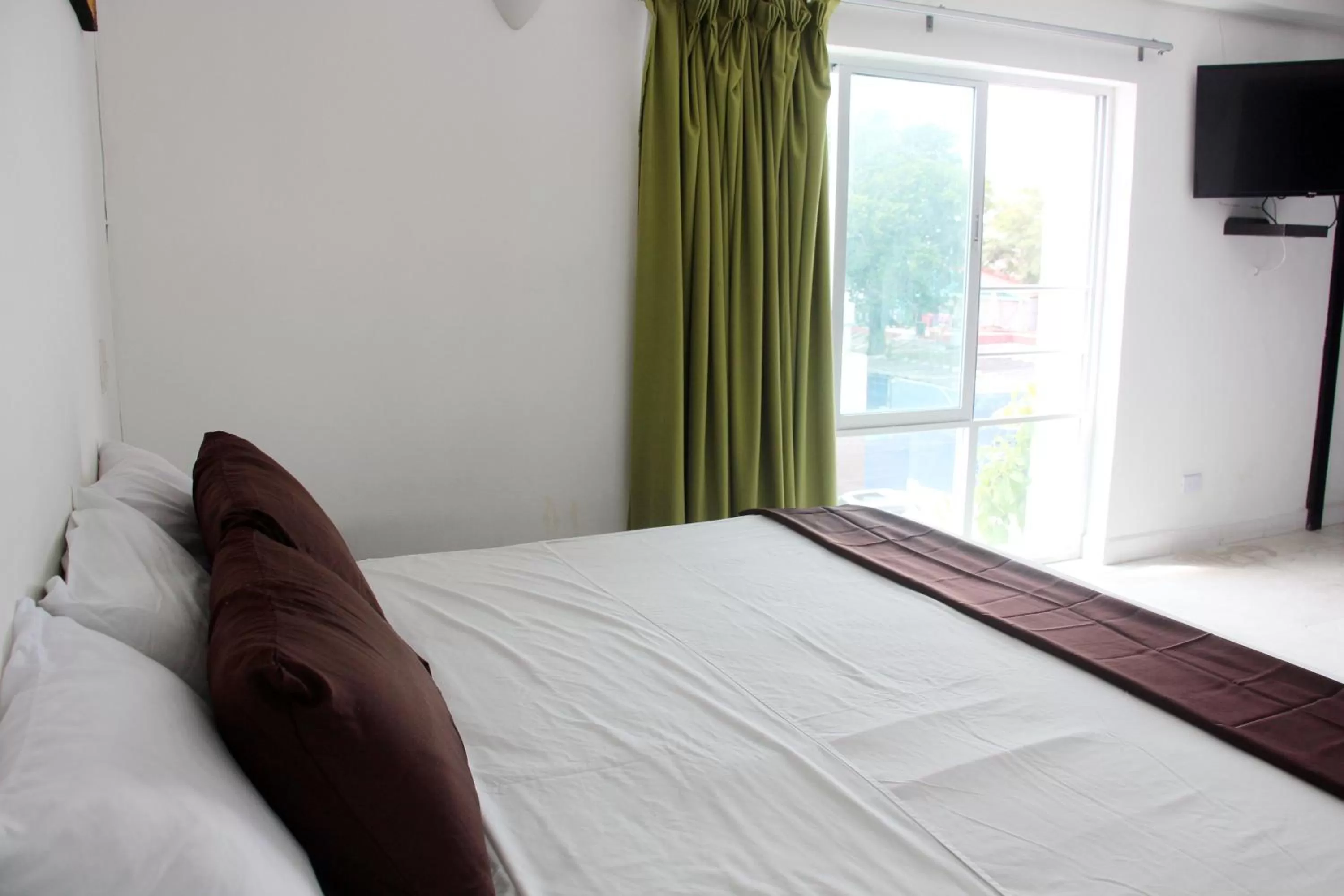 Bed in Hotel & Hostal Casa de Luz Cancun