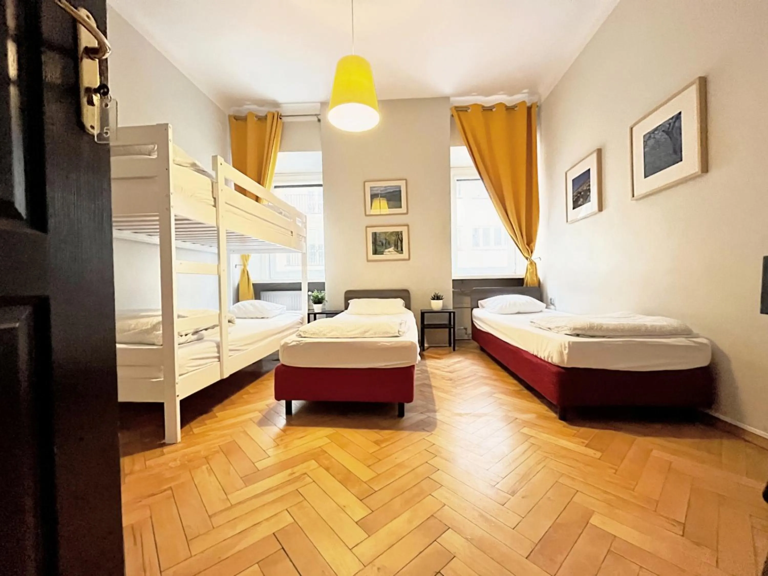 Photo of the whole room, Bed in Hostel Helvetia Rooms Warsaw CITY CENTER and OLD TOWN