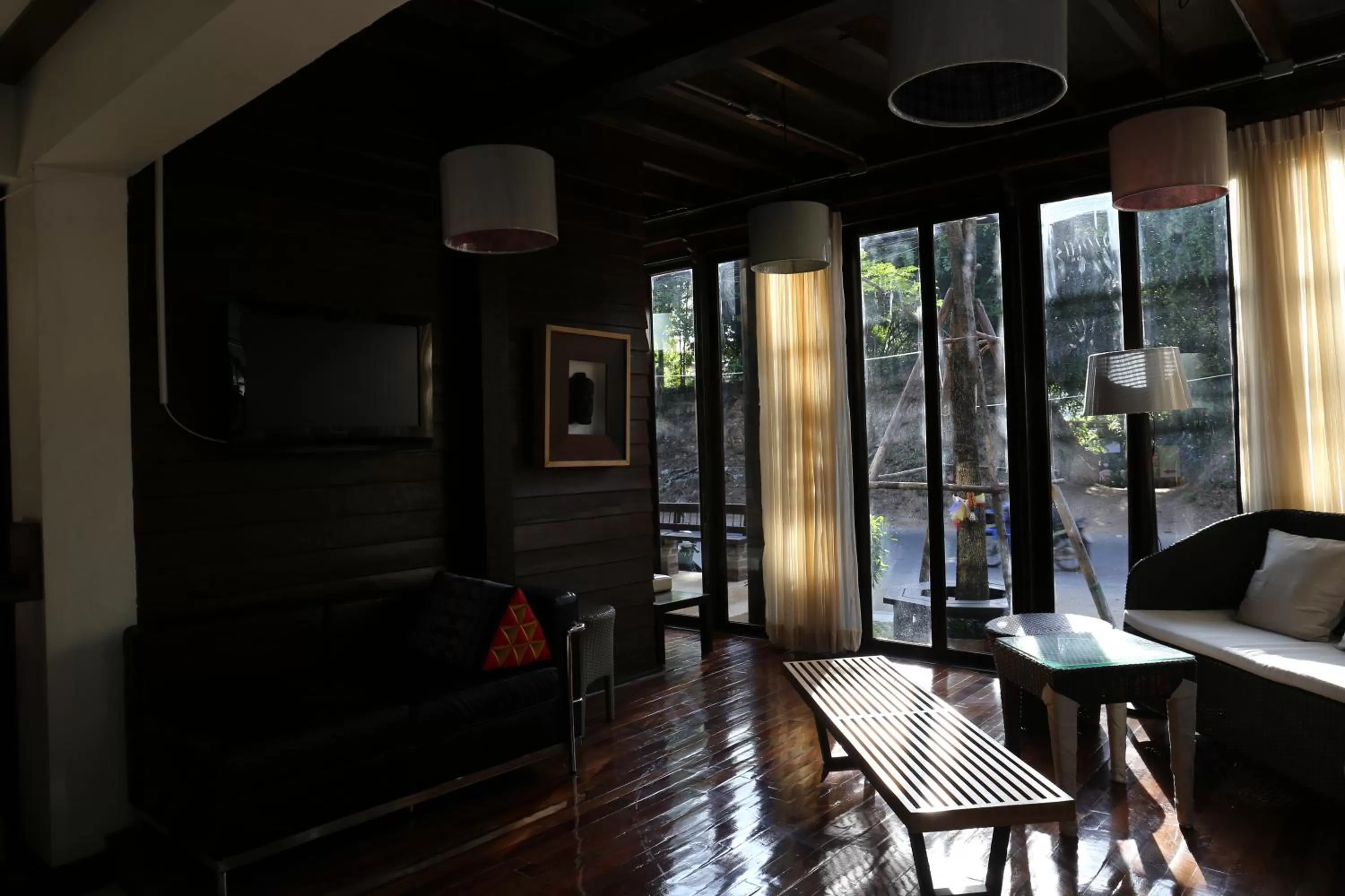 Communal lounge/ TV room in Kampaeng Ngam Hotel