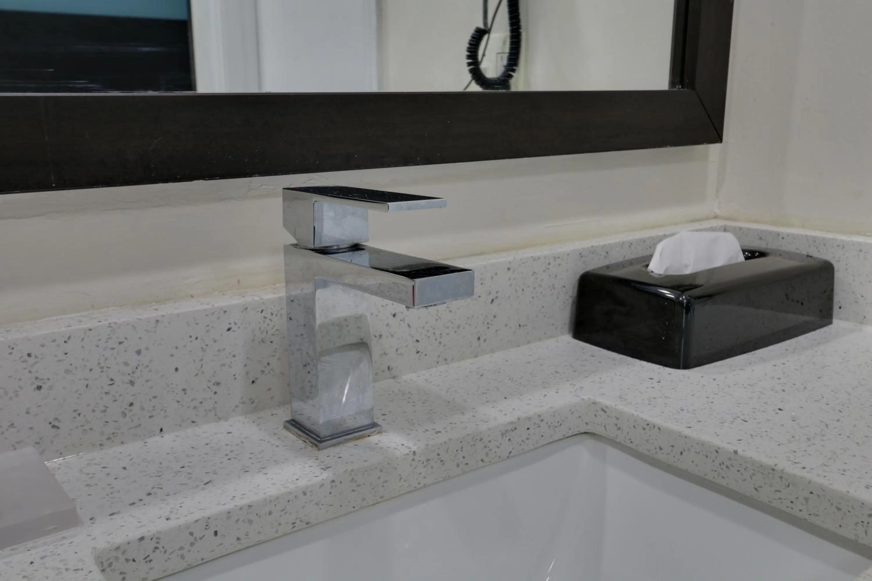 Bathroom in Travelodge by Wyndham Calhoun South I-75