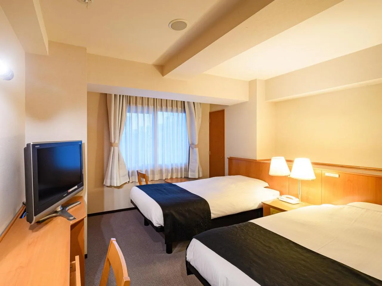 Photo of the whole room, Bed in APA Hotel Sapporo Odori Ekimae Minami