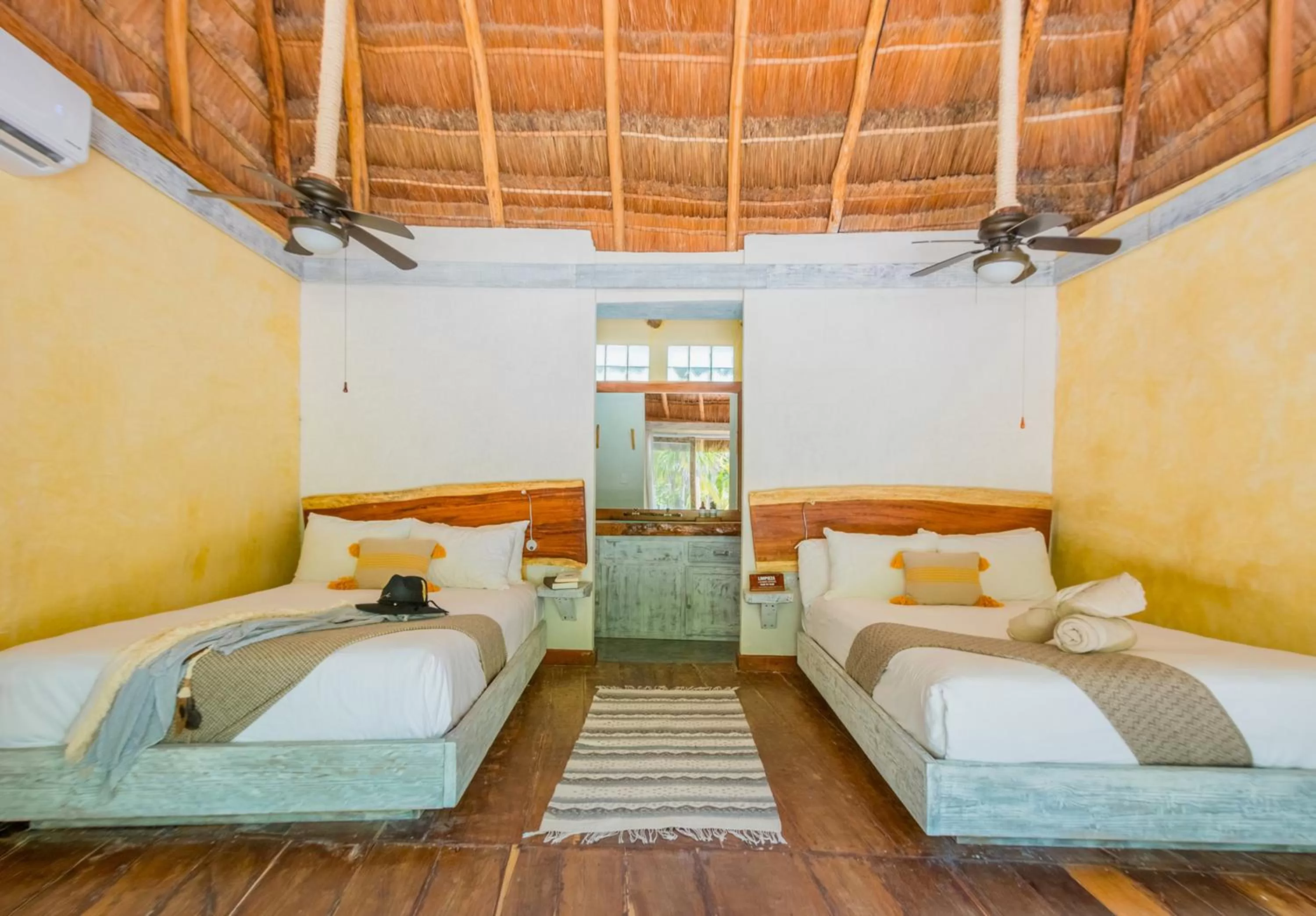 Bedroom, Bed in Villa Pescadores Tulum-Beachfront hotel by Ahau Collection