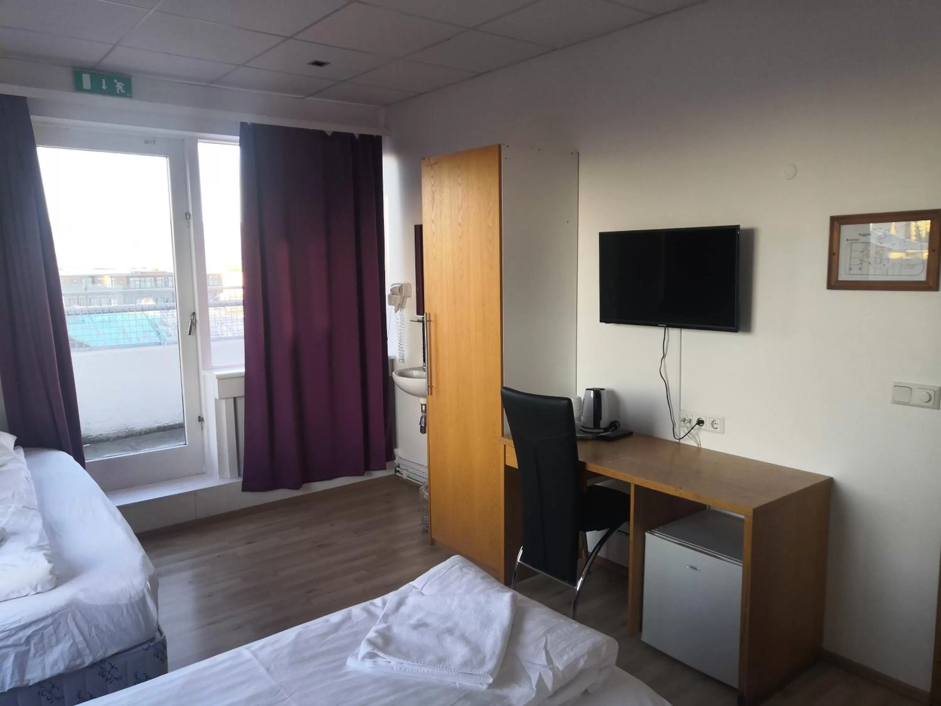 Photo of the whole room, Bed in 101 Guesthouse Hotel