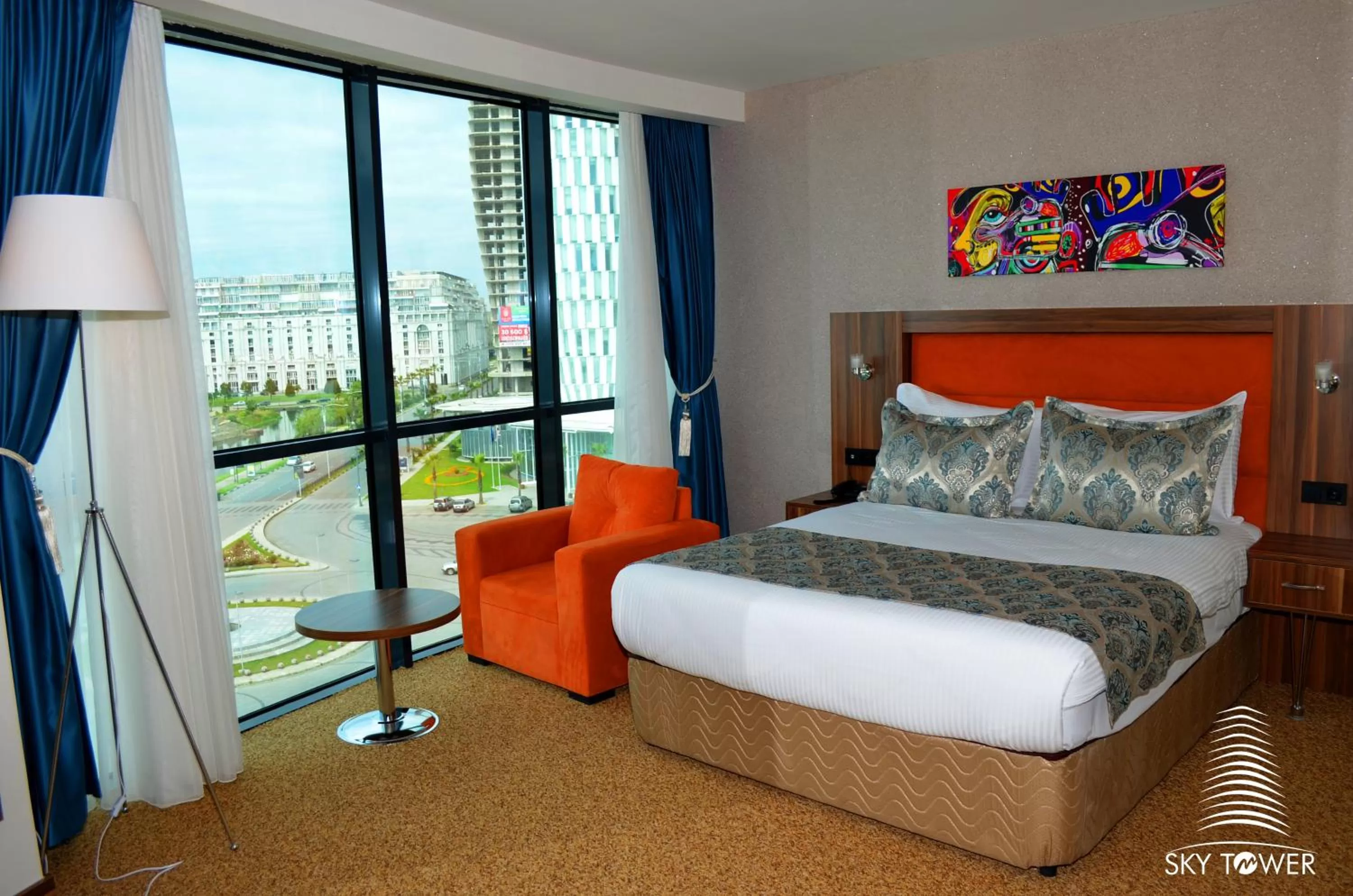 Photo of the whole room, Bed in Sky Tower King Hotel