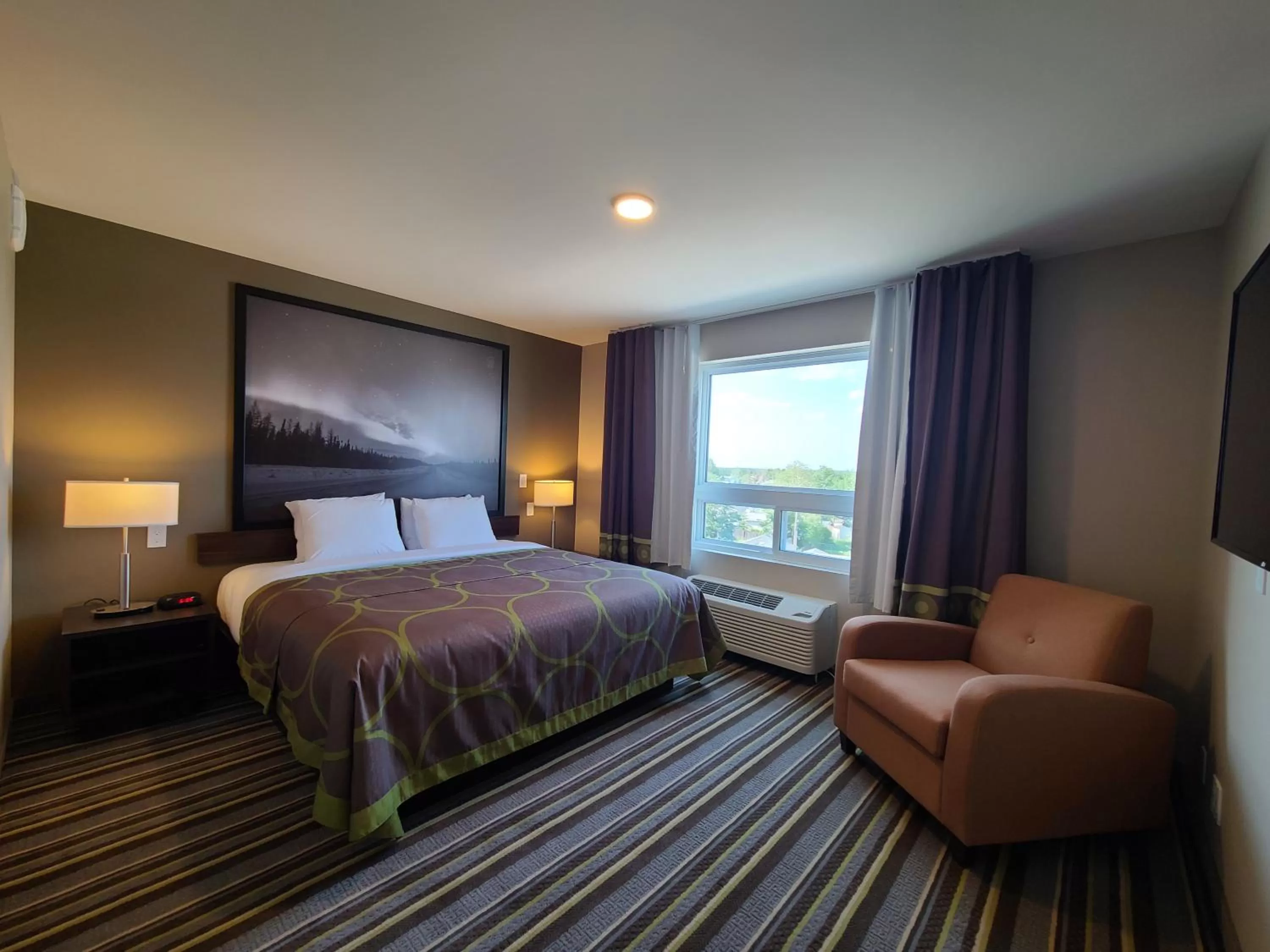 Bed in Super 8 by Wyndham Thompson