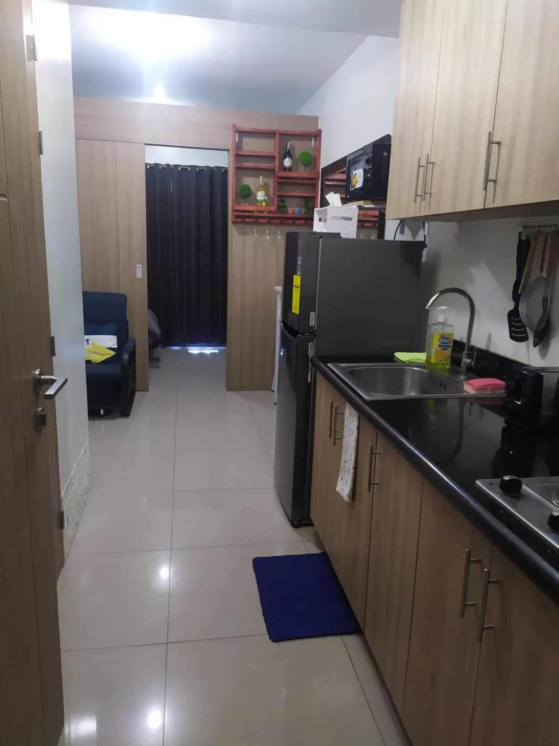 Kitchen or kitchenette in NorChel's Staycation near Mall of Asia