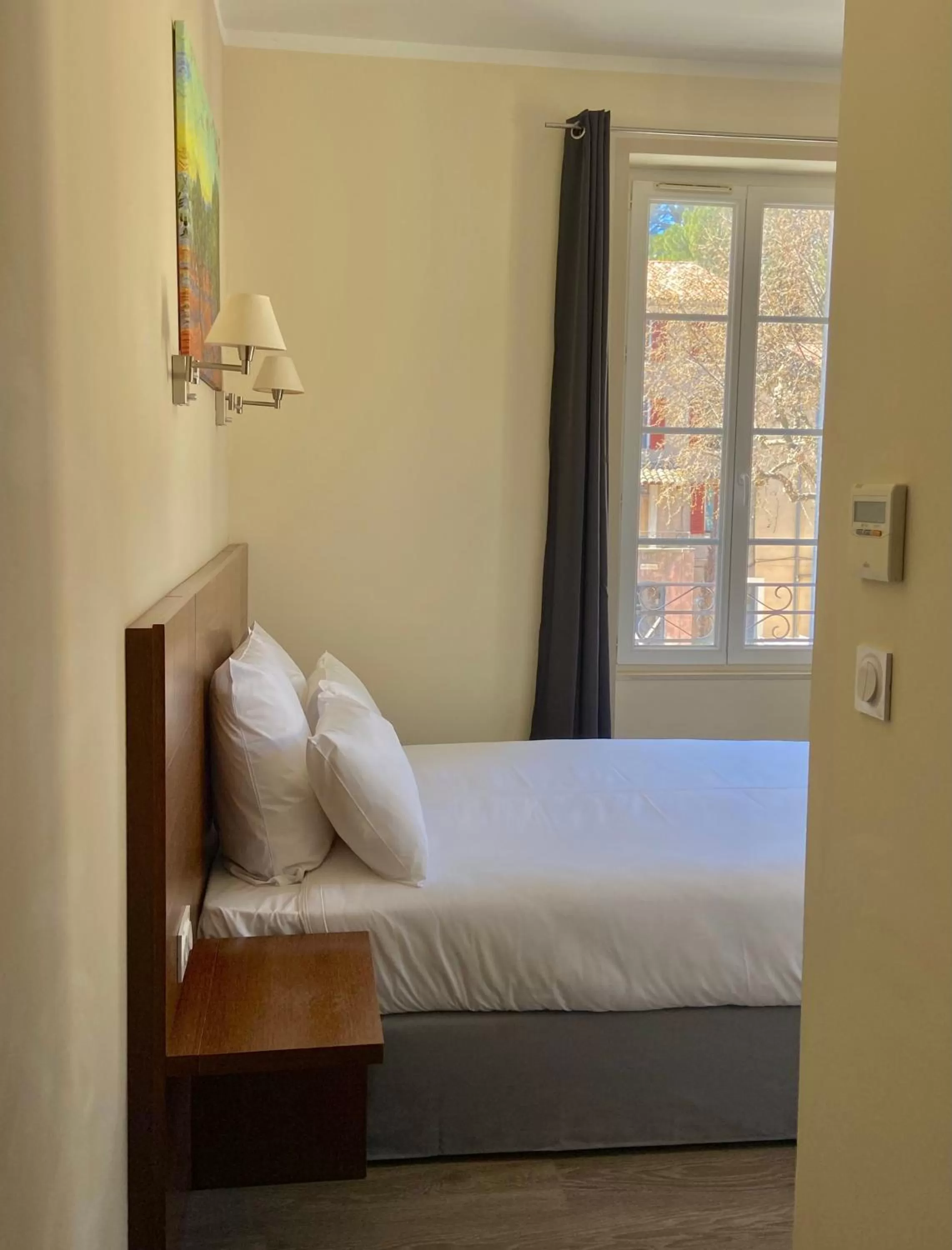 Bed in Hôtel La Falaise