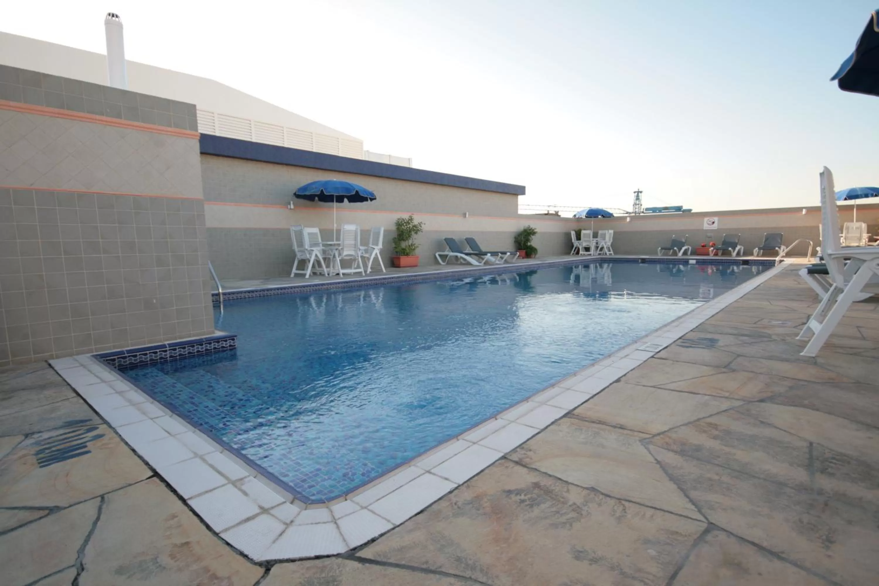 Swimming pool in Rose Garden Hotel Apartments - Al Barsha, Near Metro Station