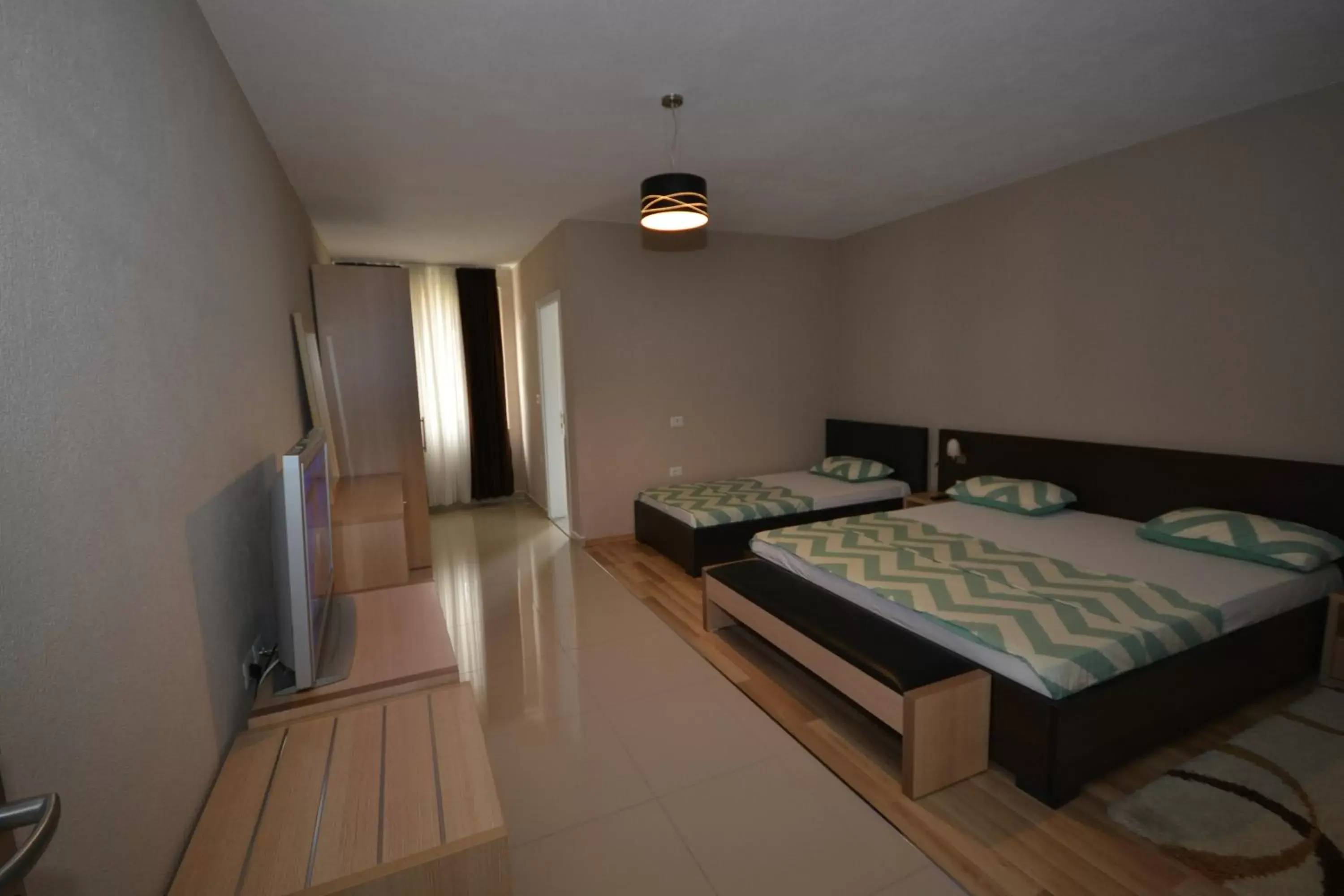 Basic Triple Room in Hotel Veri Basic Triple Room in Hotel Veri