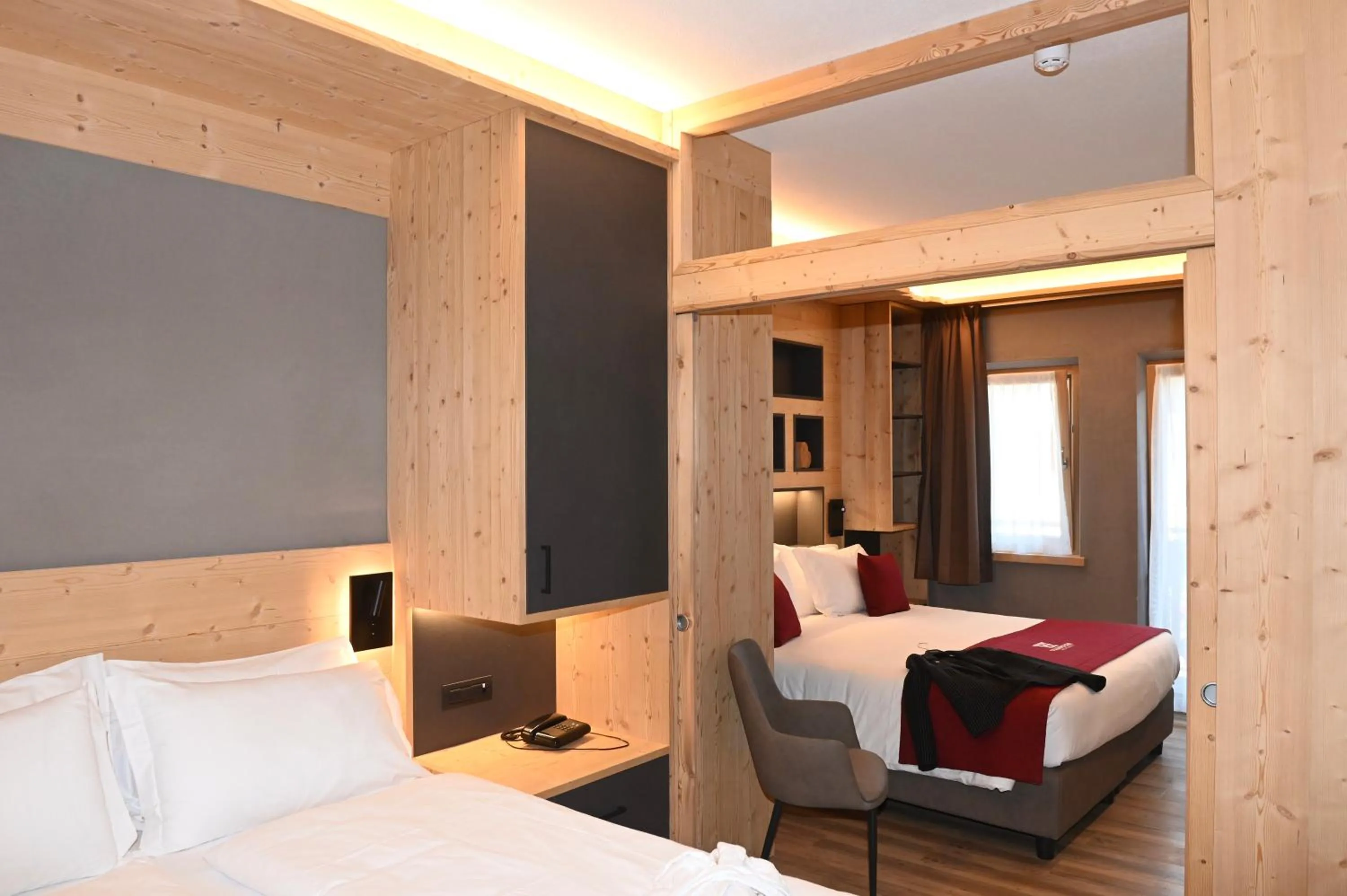 Bed in Francesin Active Hotel