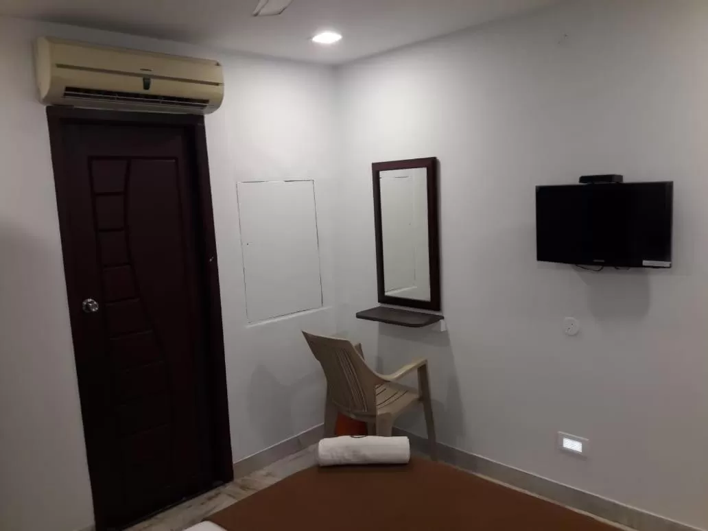 Seating area, TV/Entertainment Center in Hotel Ramco Residency A/c