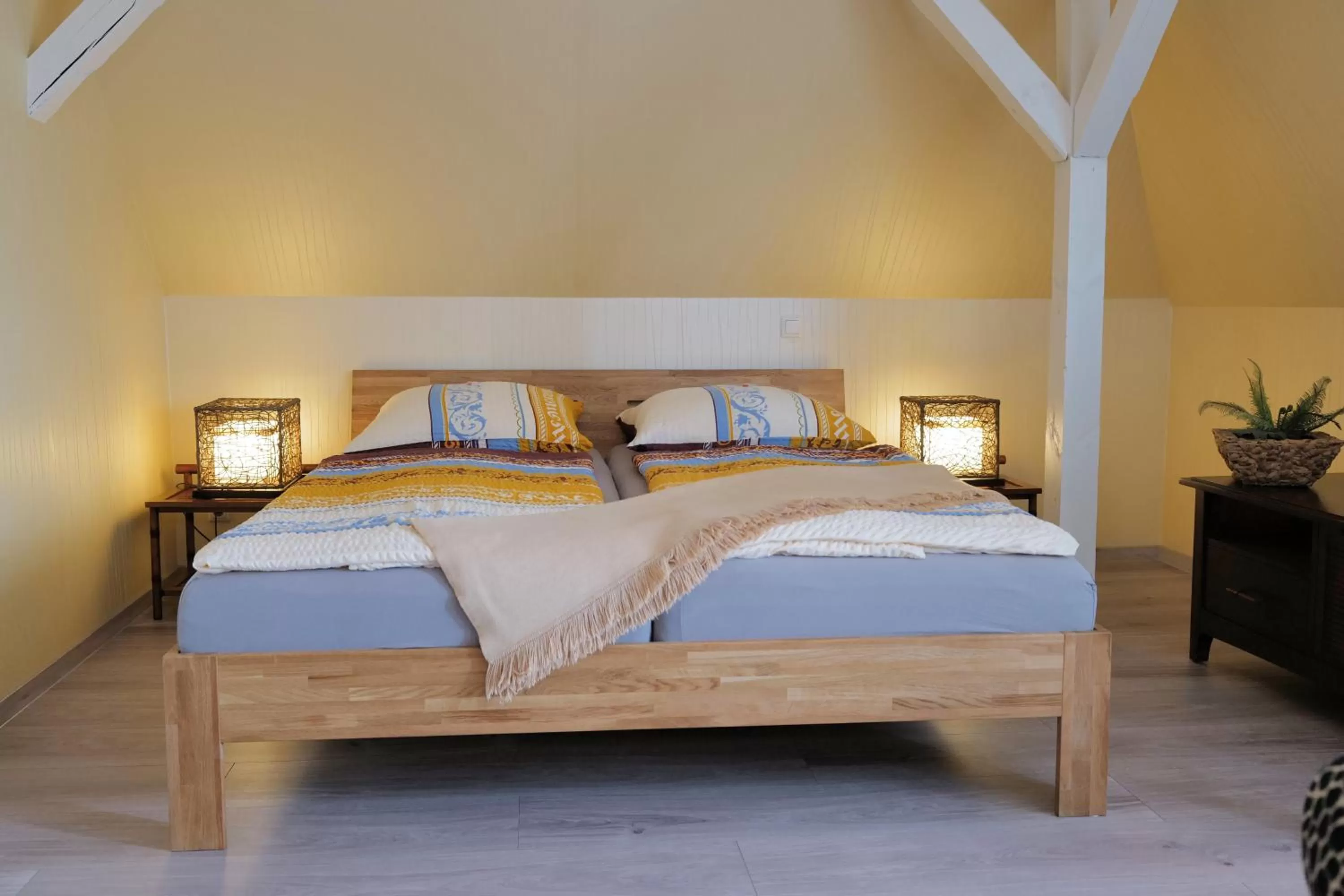 Bed in Elena Kempf Haaratelier & Guesthouse