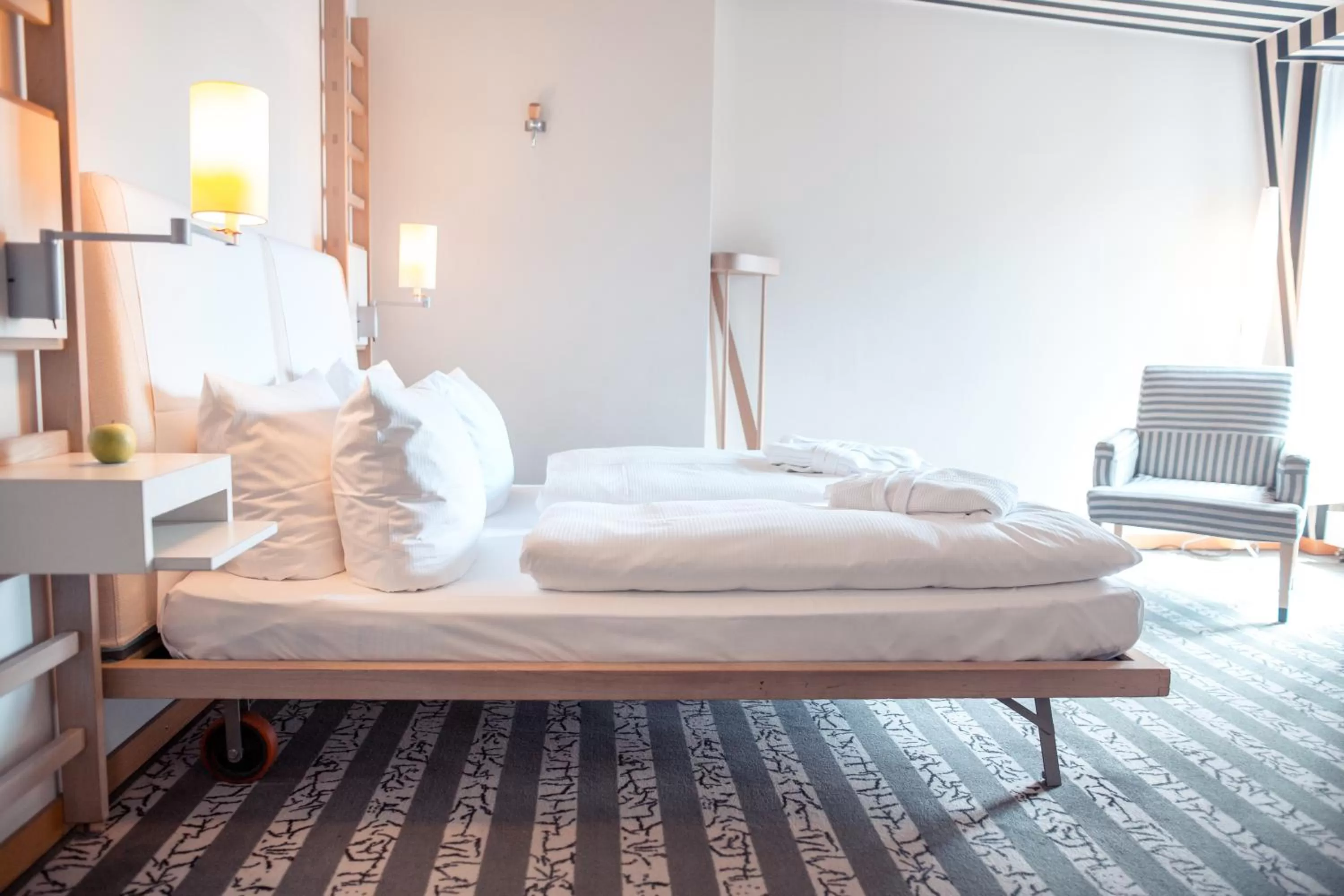 Bed in Hotel Bleibtreu Berlin by Golden Tulip