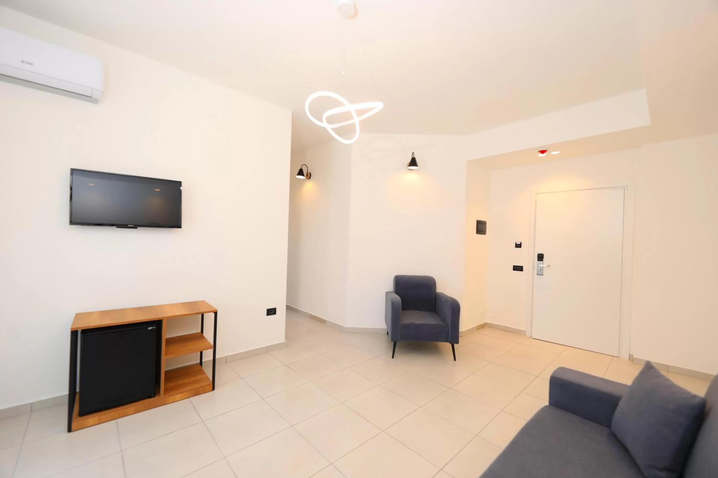 Communal lounge/ TV room in Maor Hotel