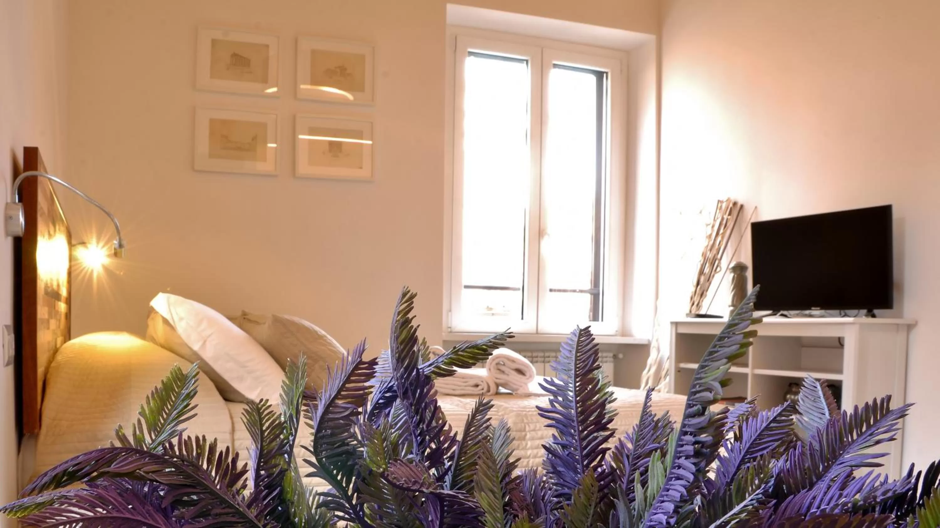 Communal lounge/ TV room, TV/Entertainment Center in B&B Casa Angelini