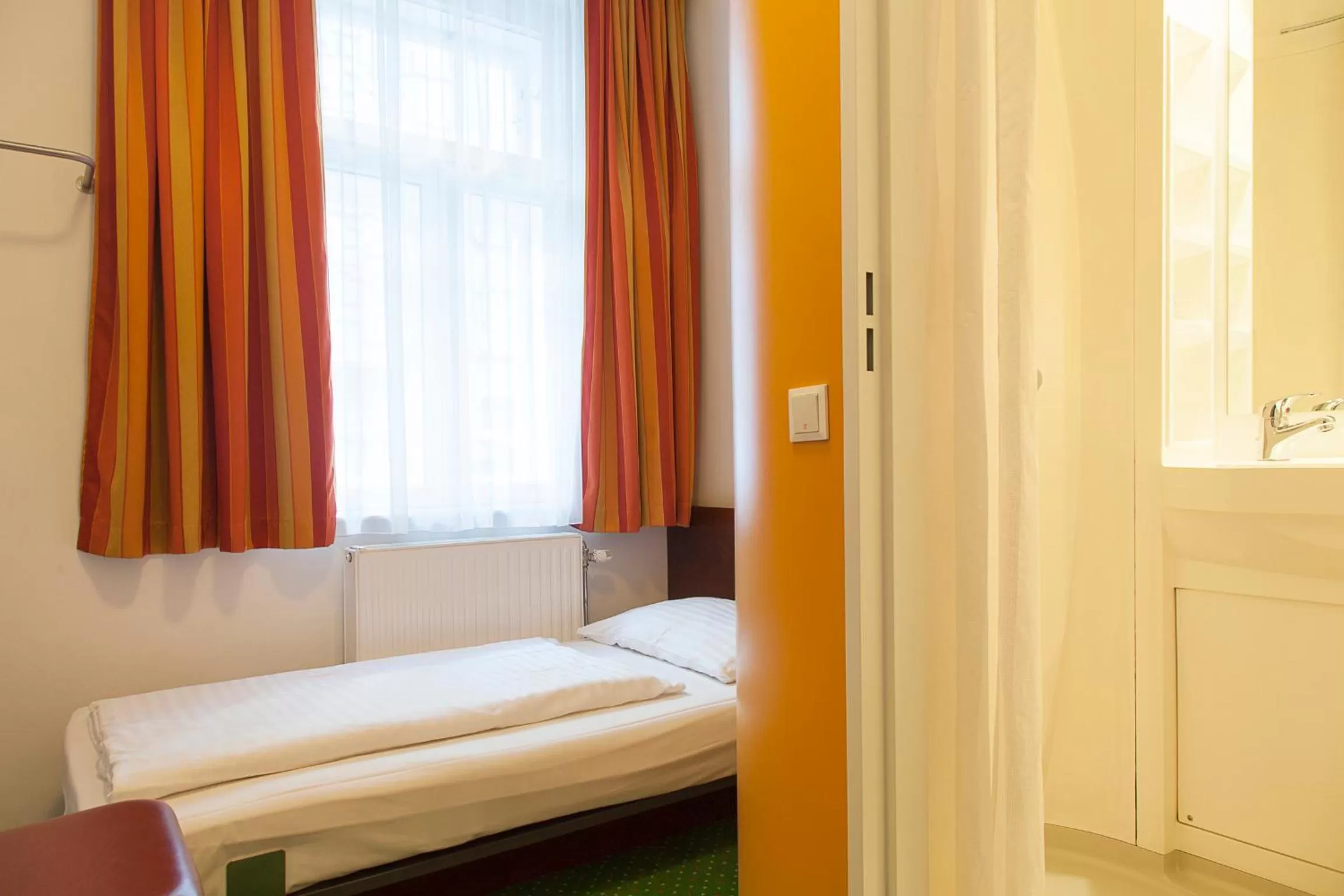 Bed in Pension Stadthalle