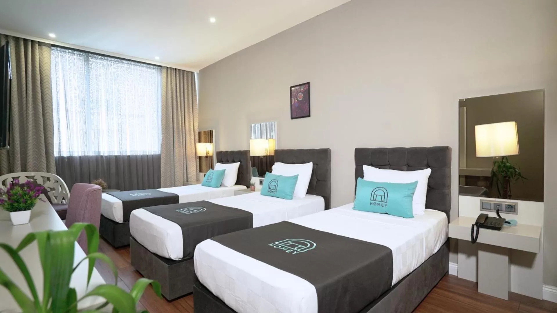 Bed in Homey AirPort Hotel