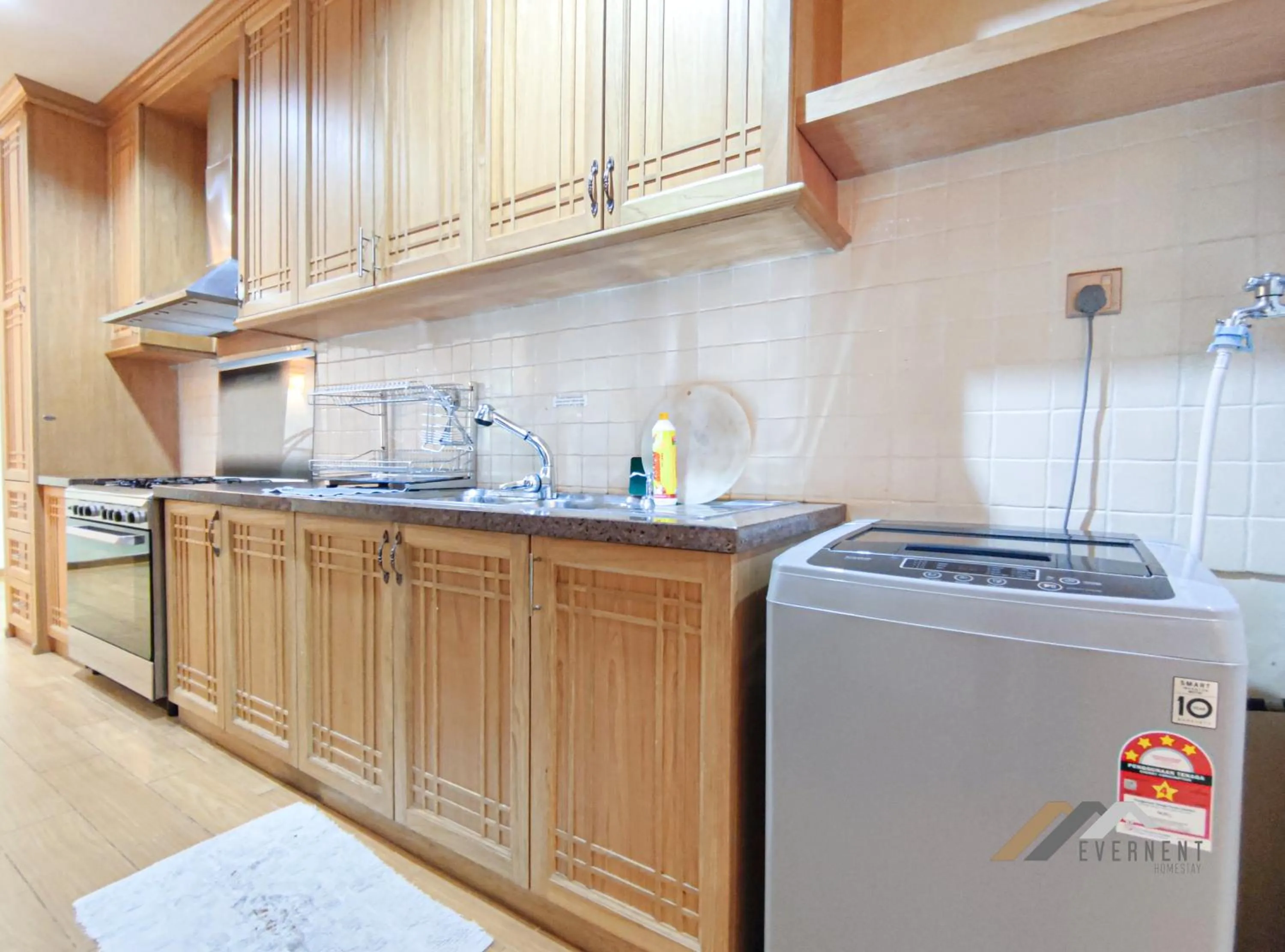 Kitchen or kitchenette in Mciti Suites by Evernent