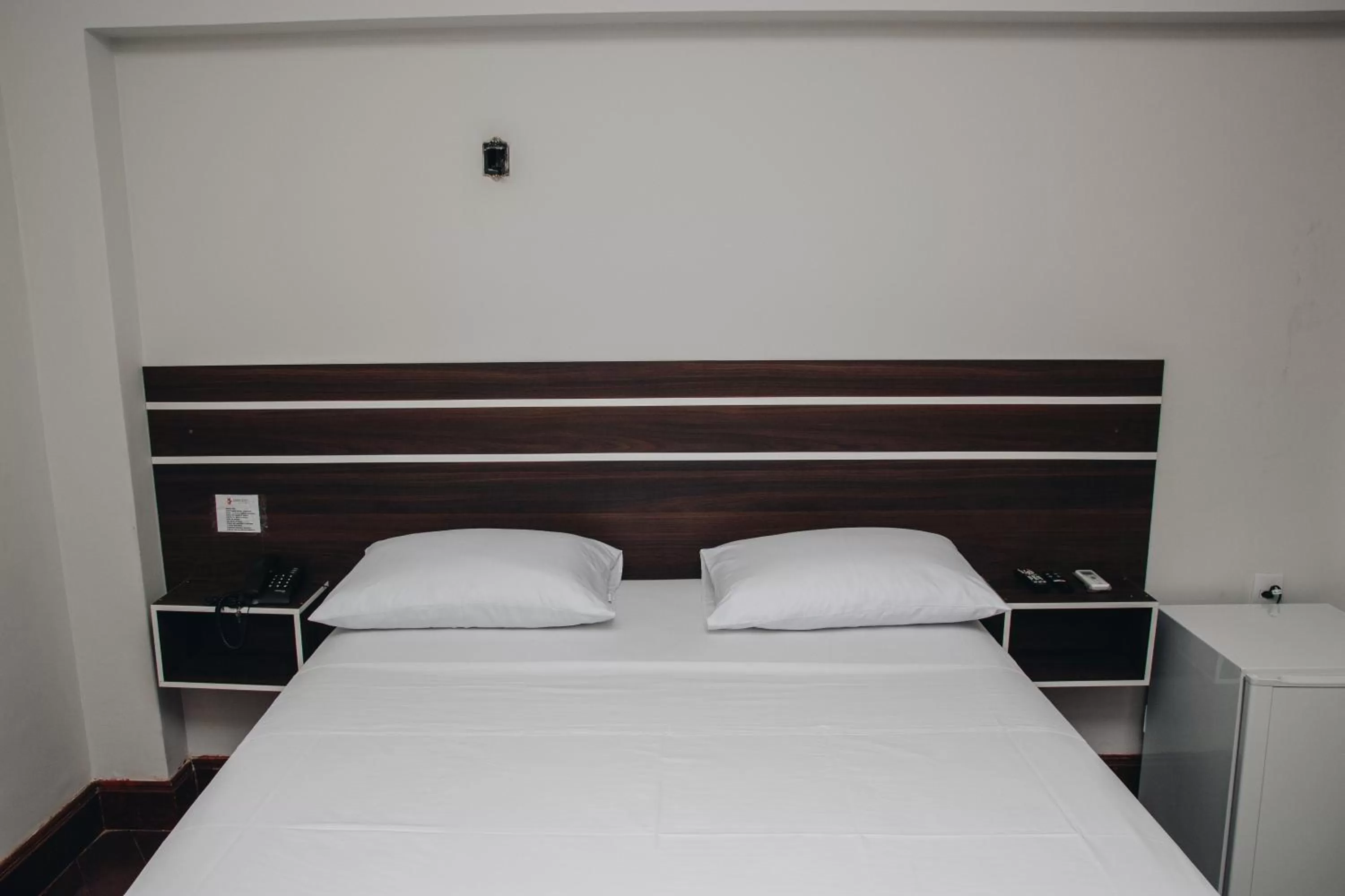 Bed in SAMIR HOTEL COMFORT