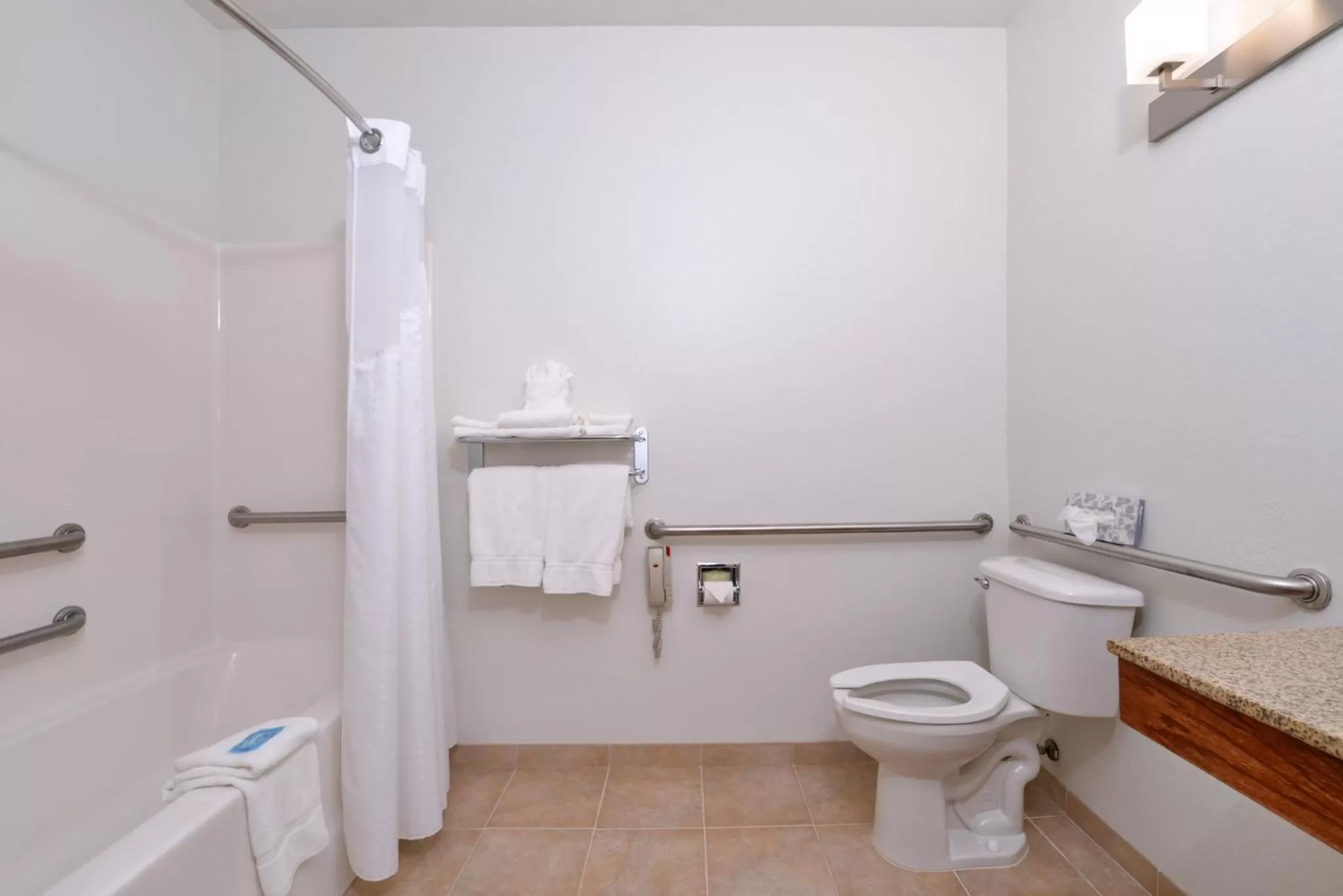 Bathroom in Holiday Inn Express Hotel & Suites Omaha West by IHG