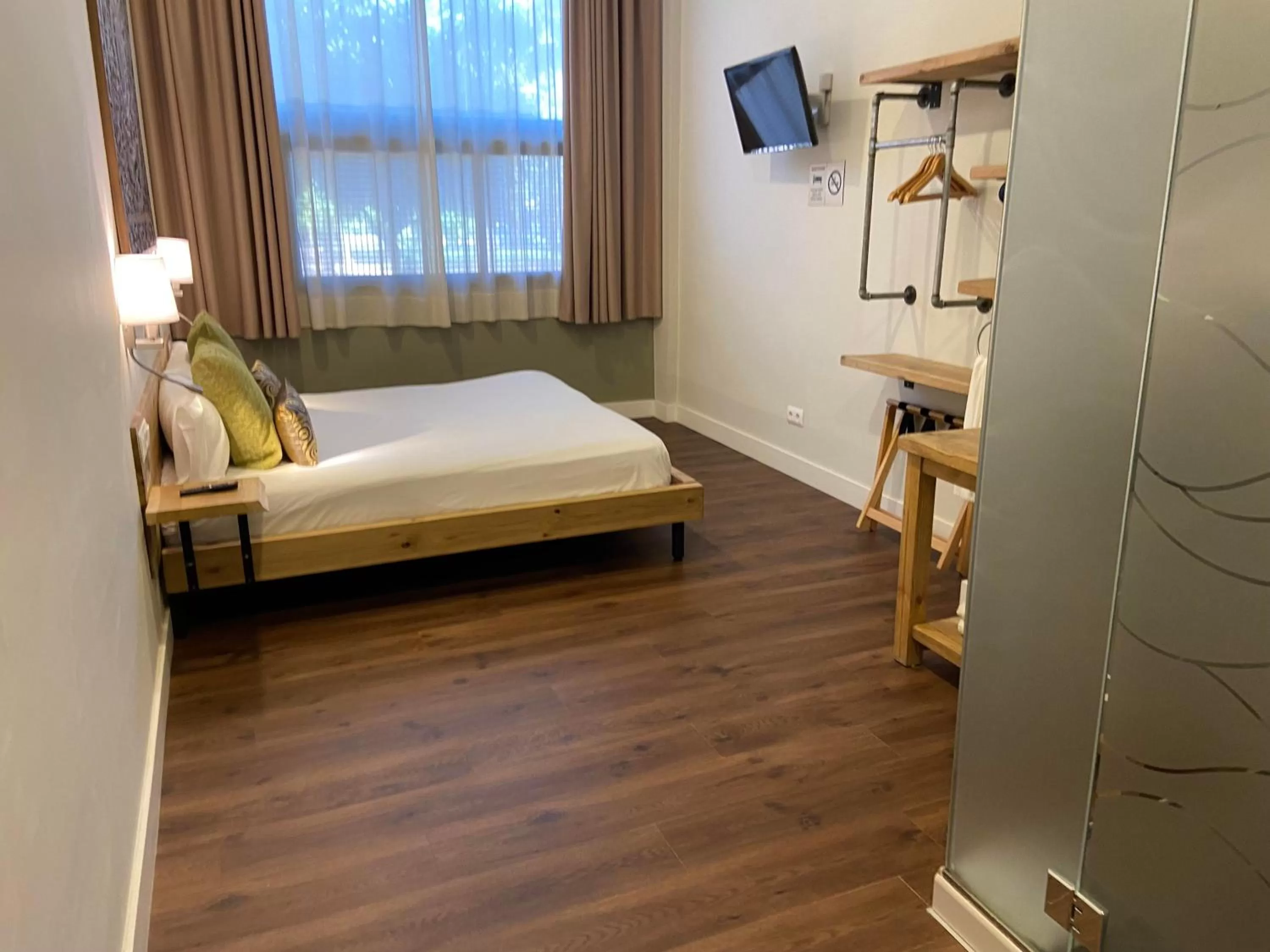 Bedroom, Bed in Hotel Radha