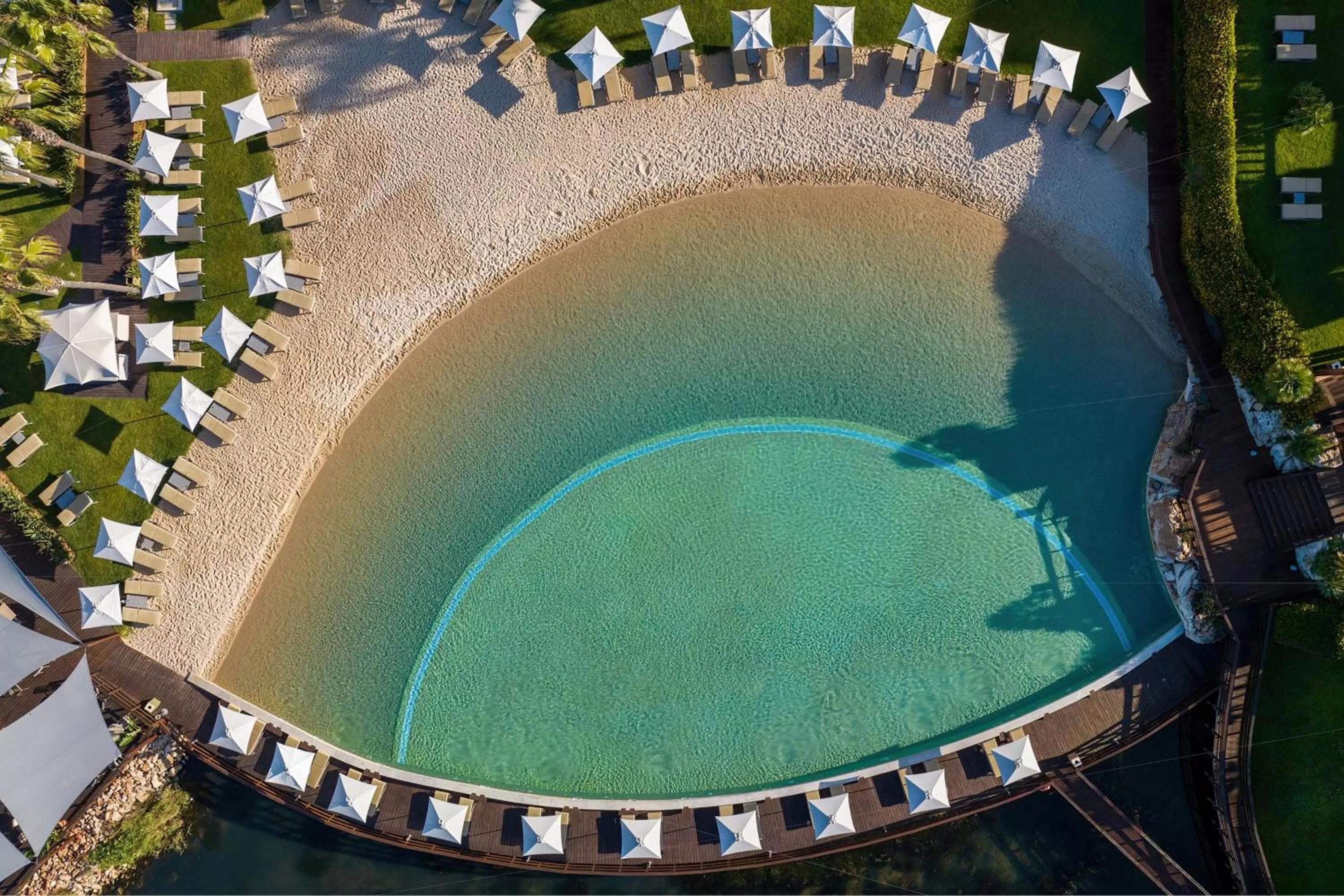 Swimming pool in Domes Lake Algarve, Autograph Collection