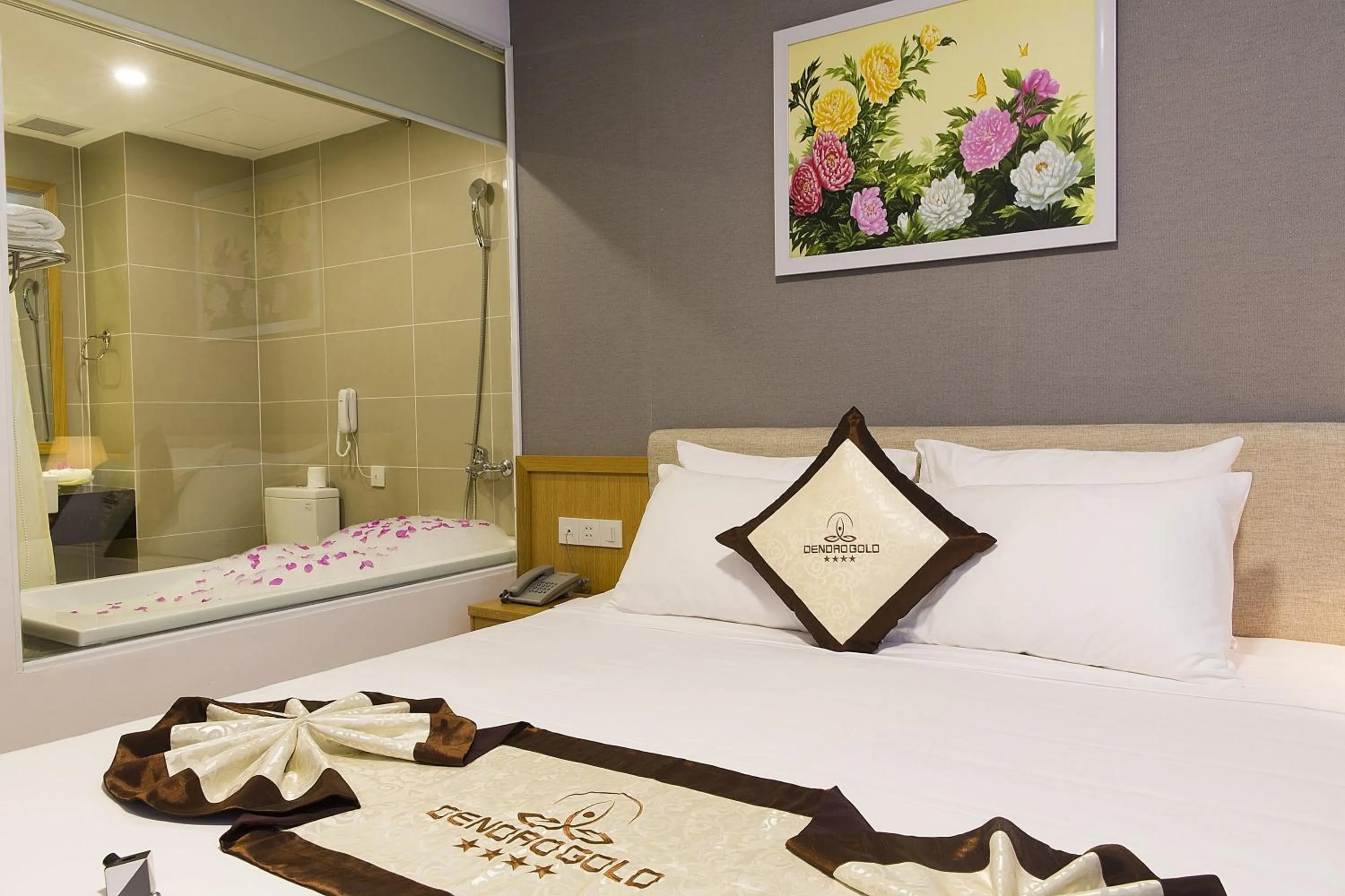 Bed in Dendro Gold Hotel