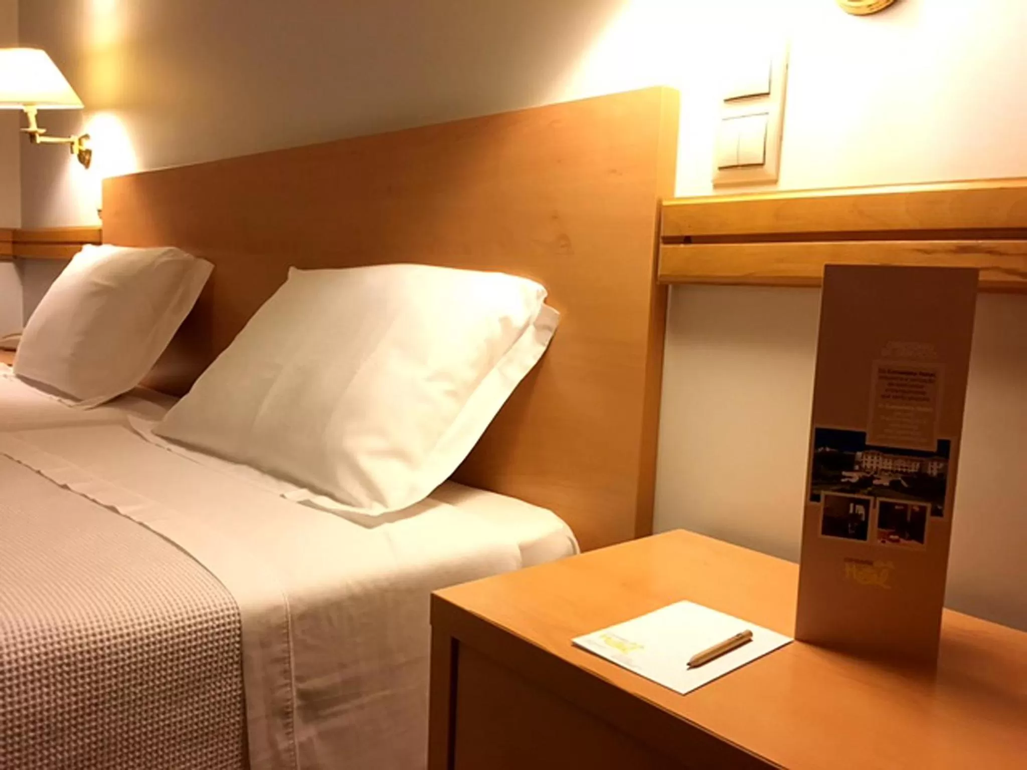 Bed in Consolata Hotel