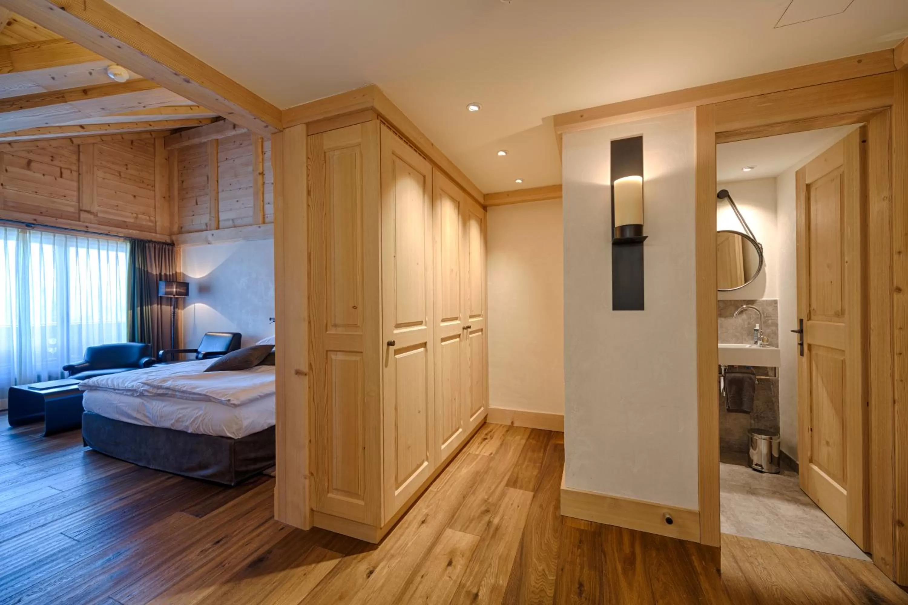 Photo of the whole room, Bed in Bernerhof Swiss Quality Hotel Gstaad