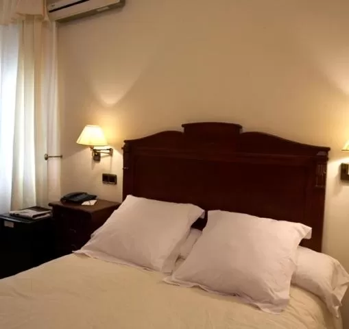 Bed in Hotel Juanito