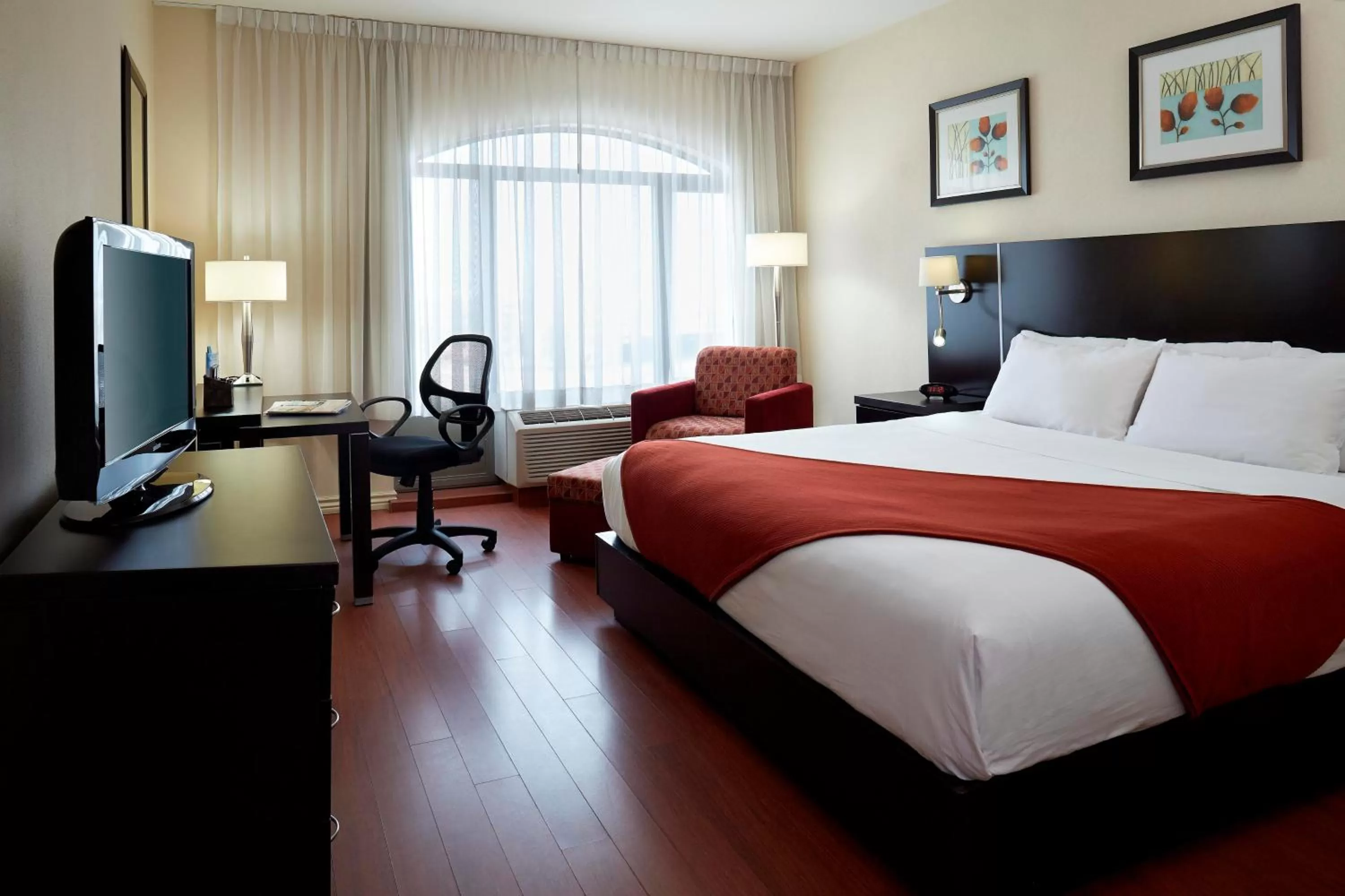 Photo of the whole room, Bed in Holiday Inn & Suites Montreal Airport by IHG